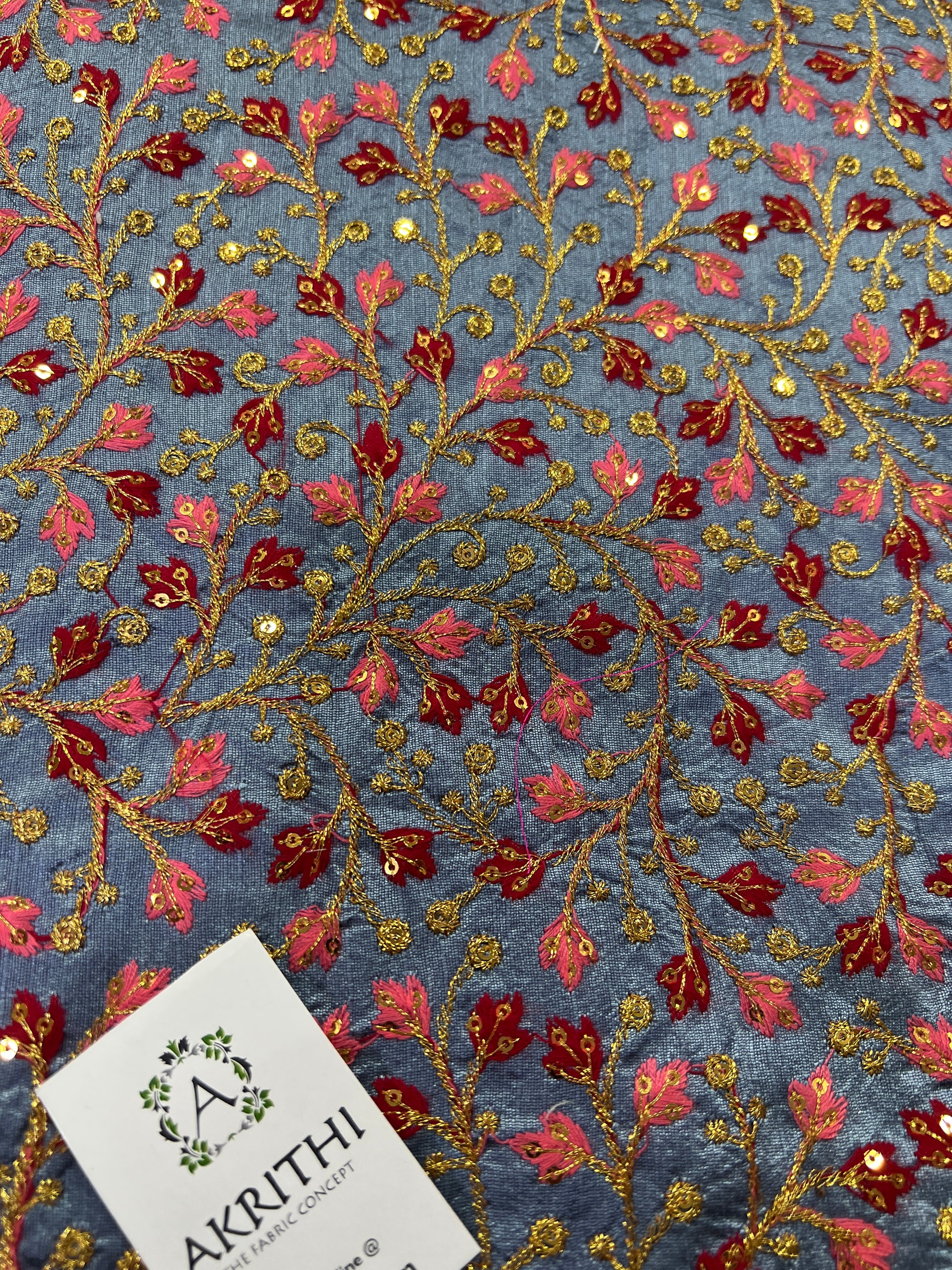 Embroidery on raw silk fabric