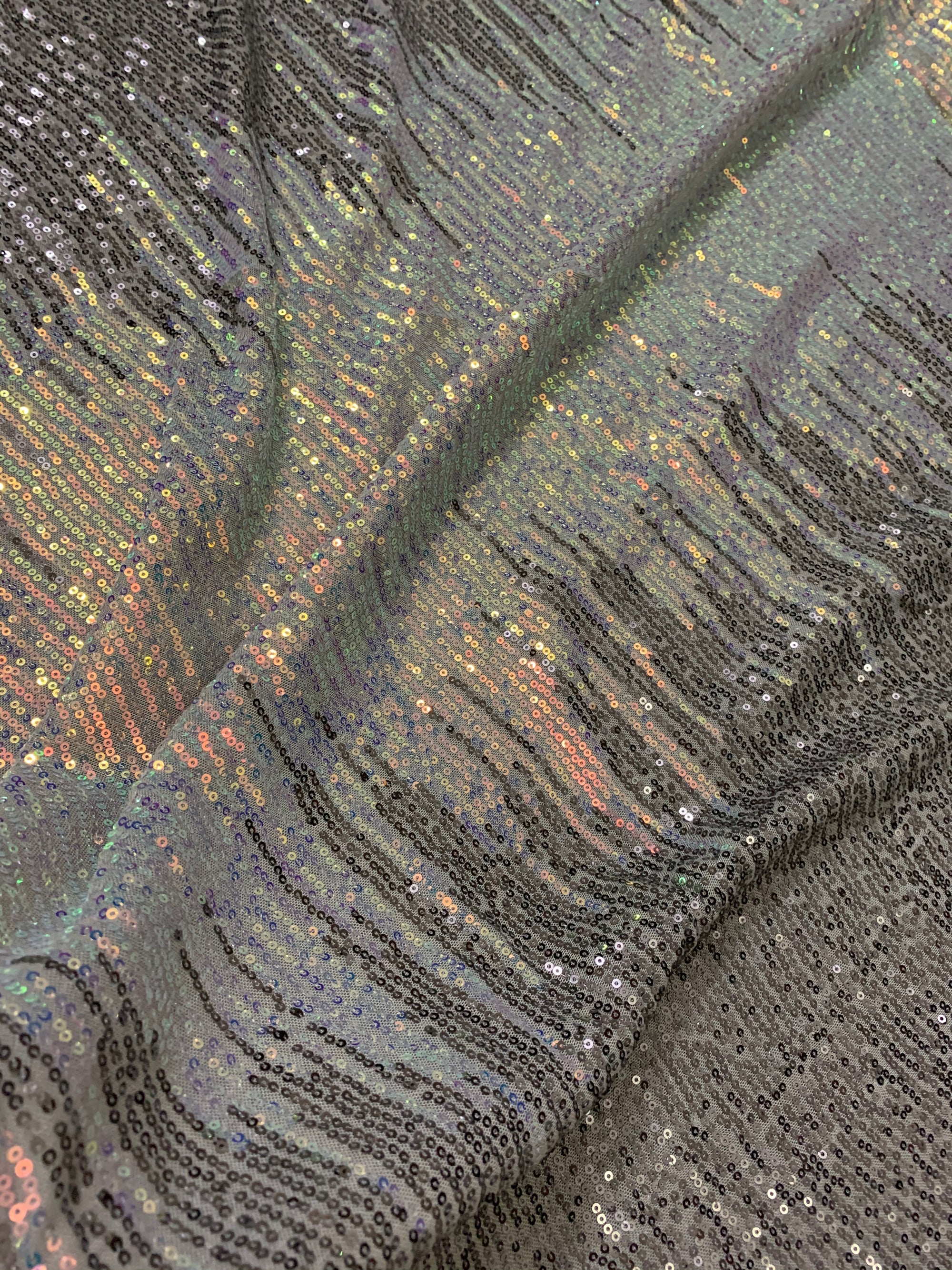 Sequins on micro Lycra net fabric