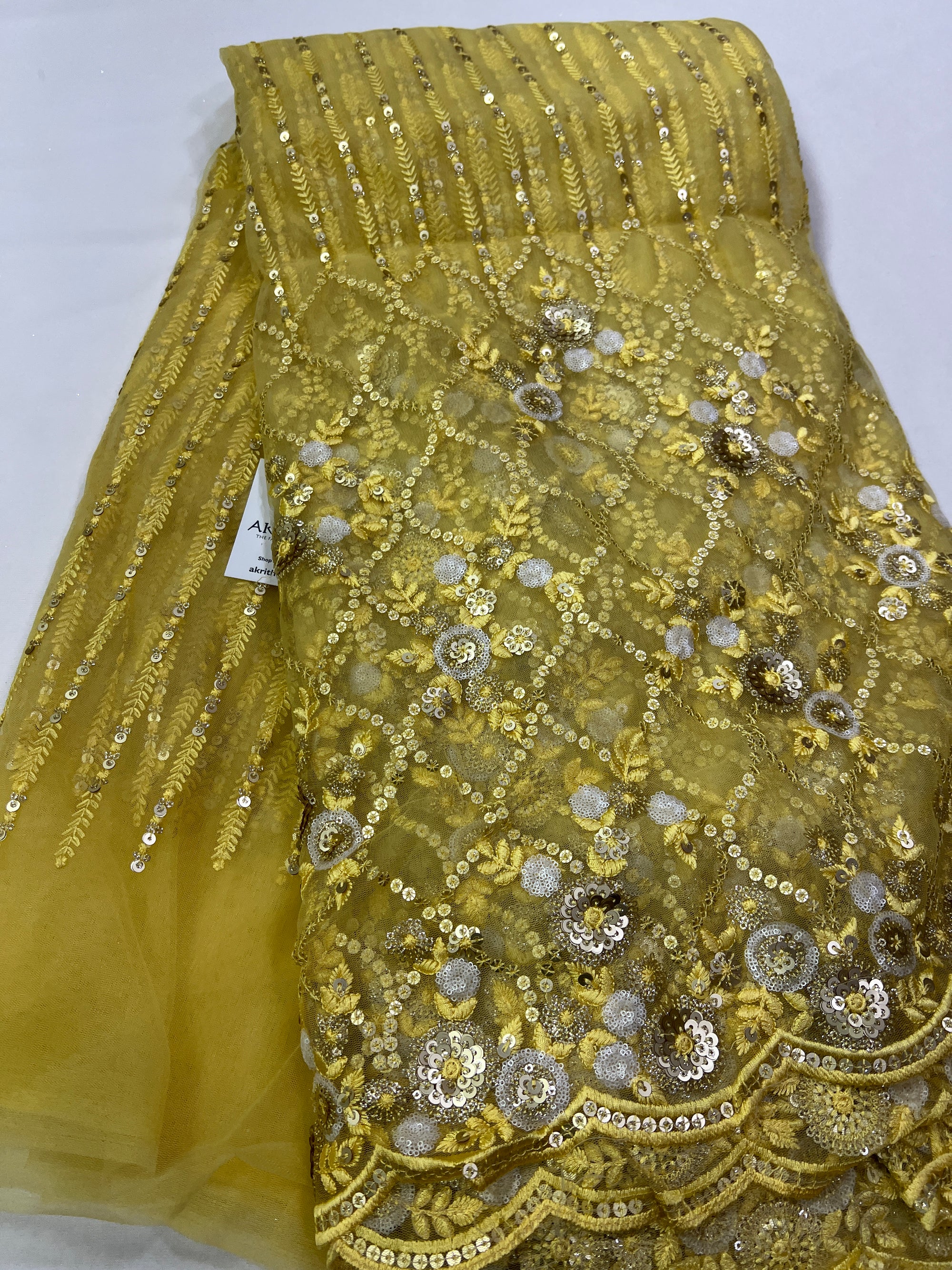 Embroidery on net fabric