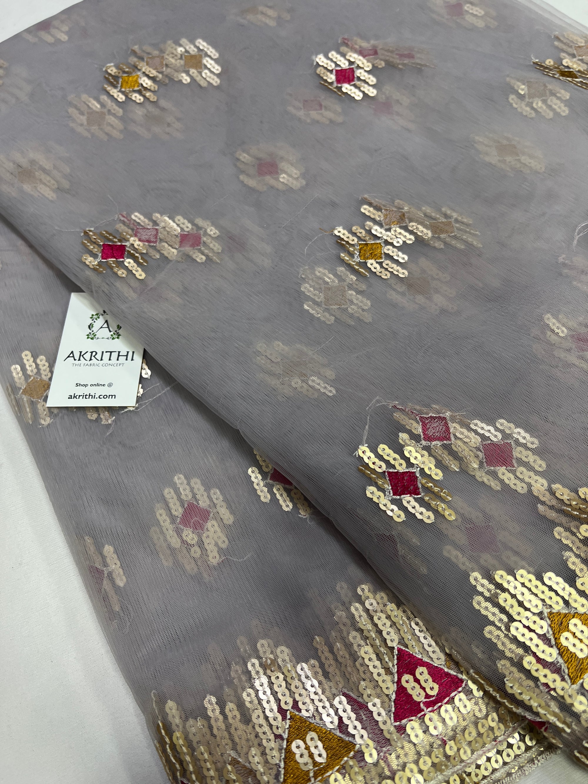 Embroidery on net fabric