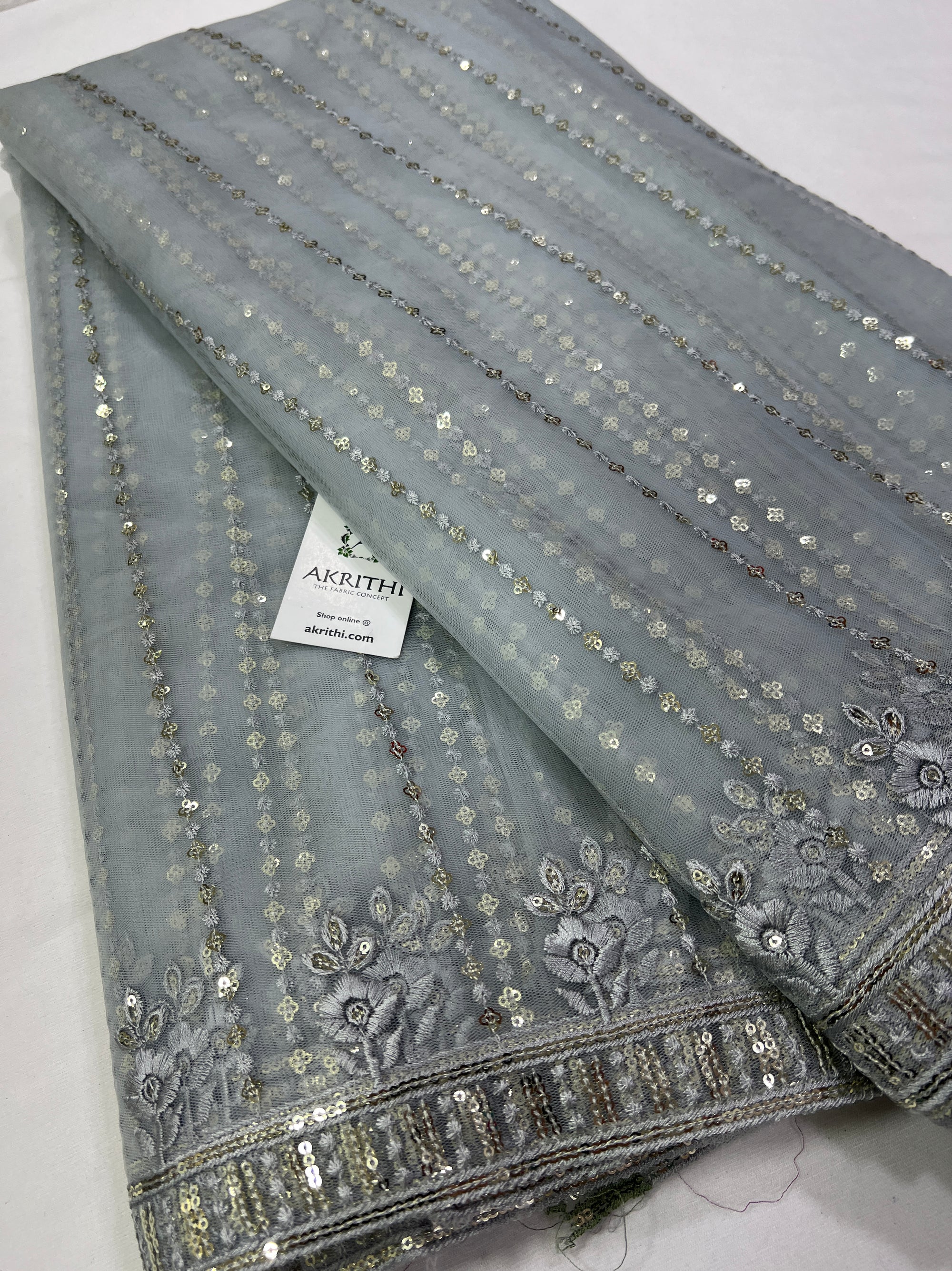 Embroidery on net fabric