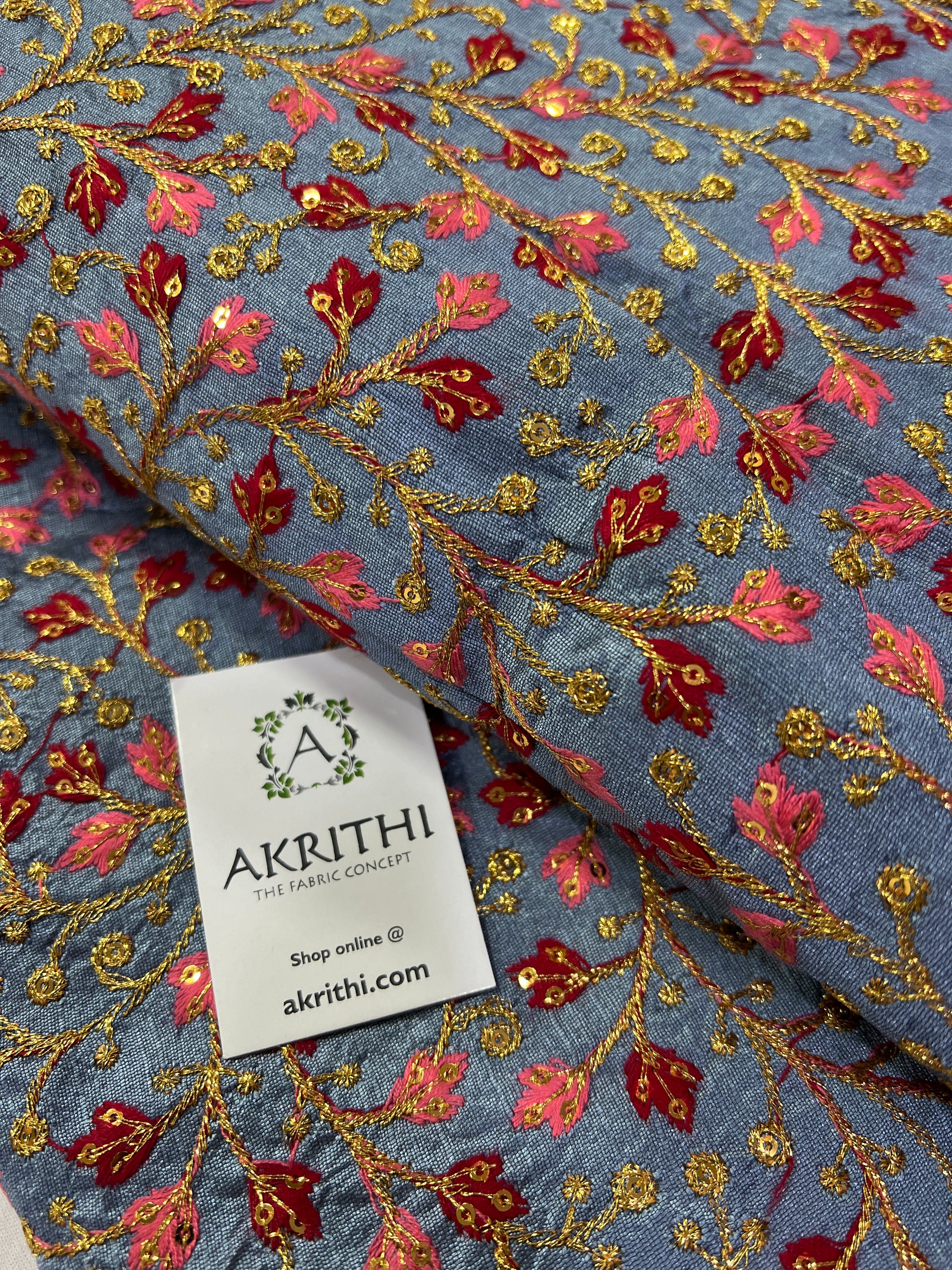 Embroidery on raw silk fabric