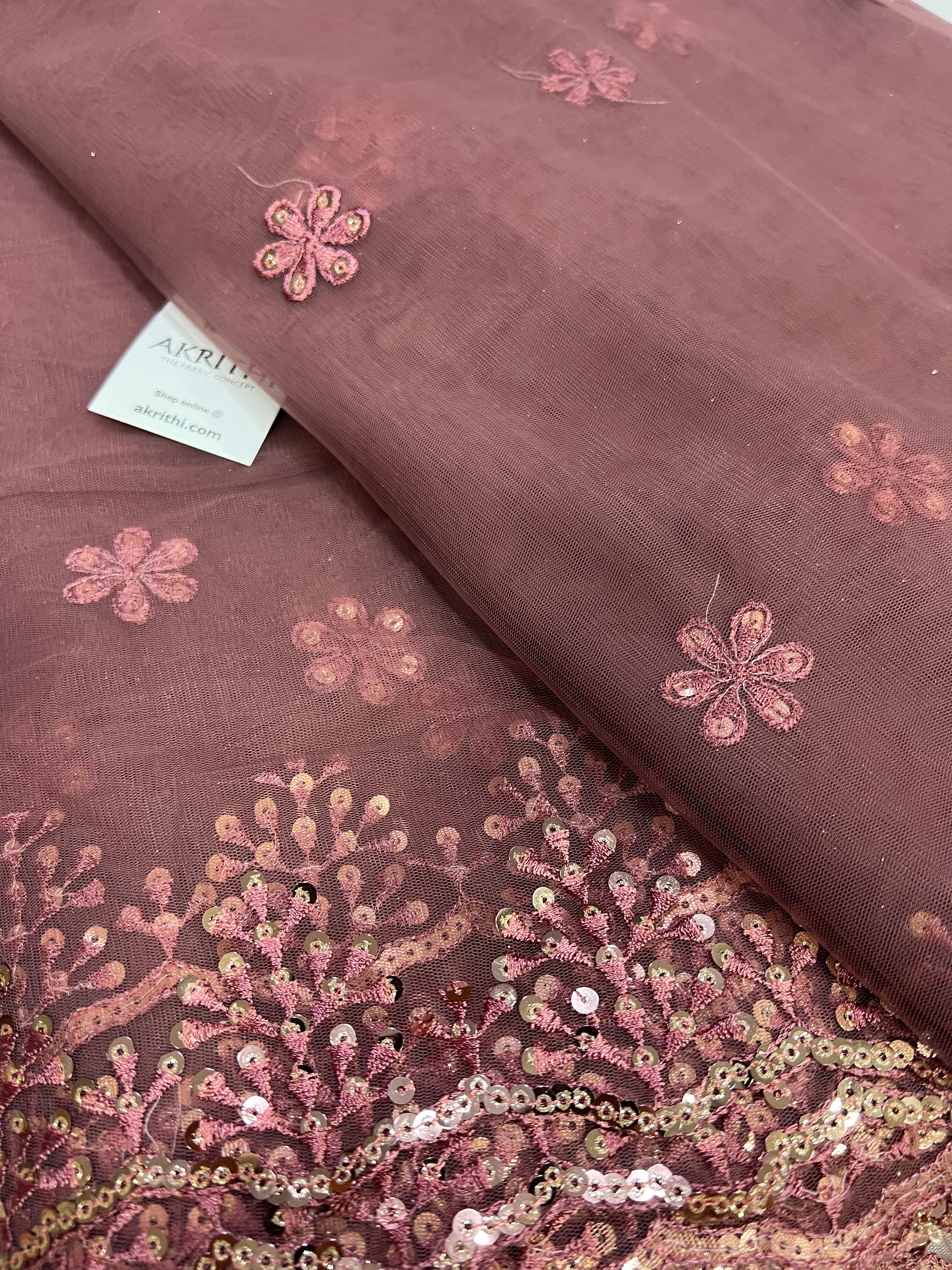 Embroidery on net fabric