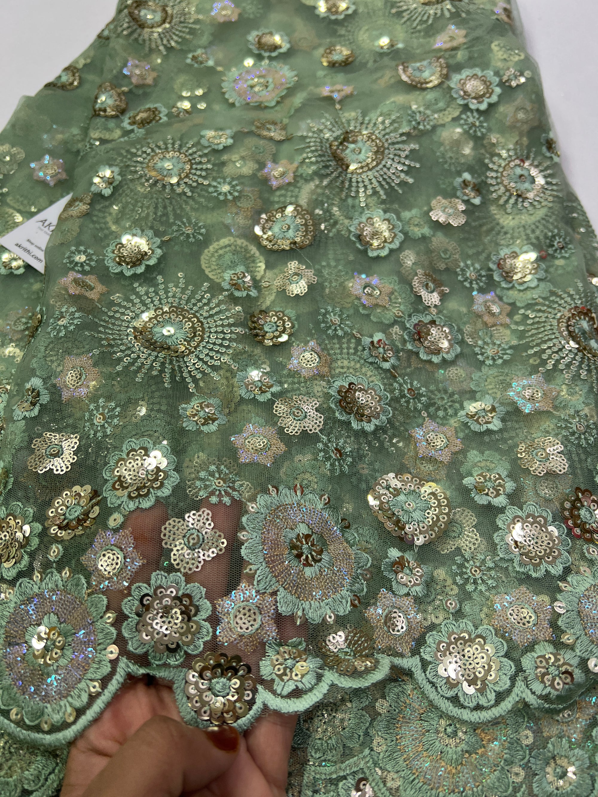 Embroidery on net fabric