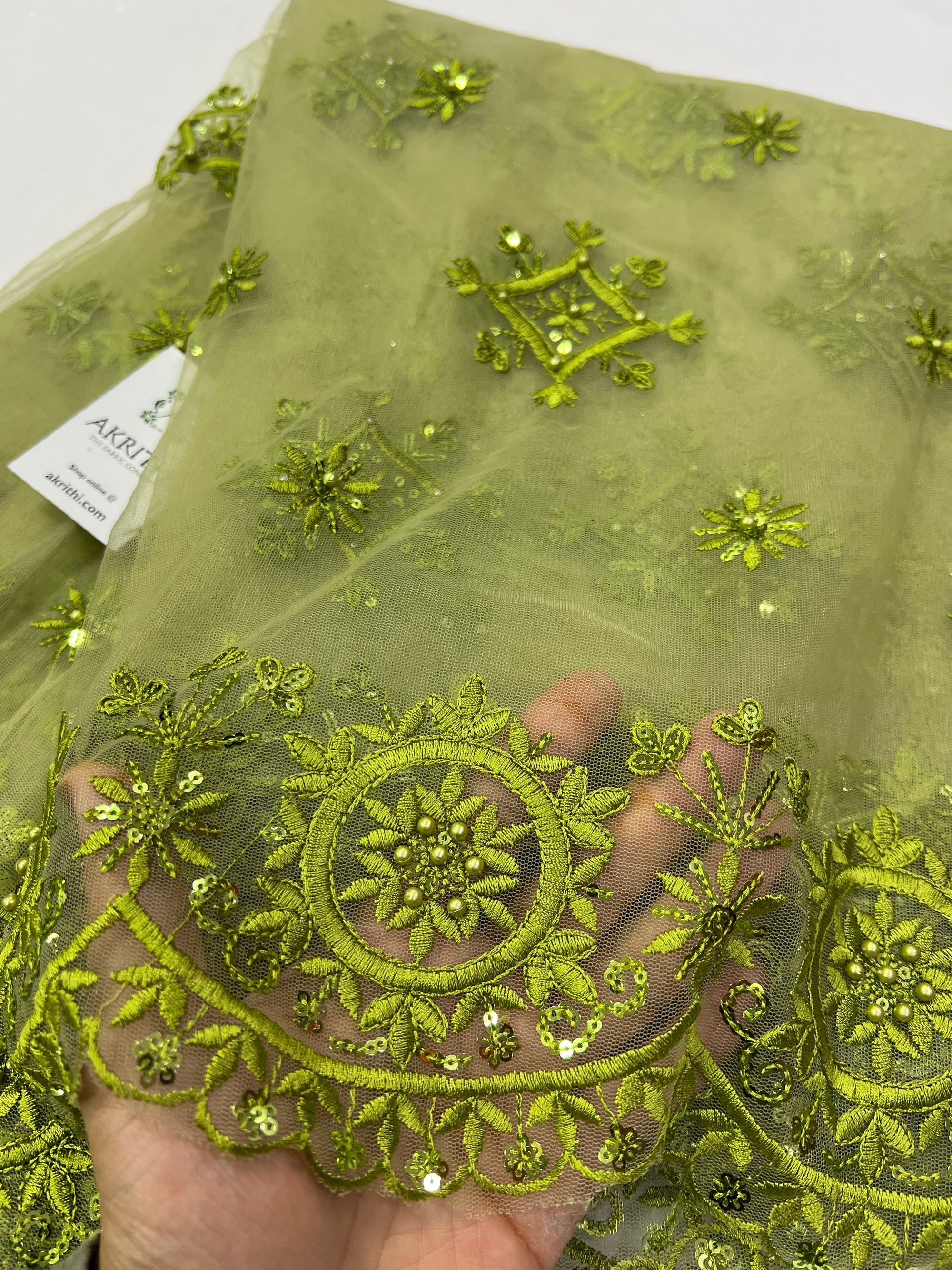 Embroidery on net fabric
