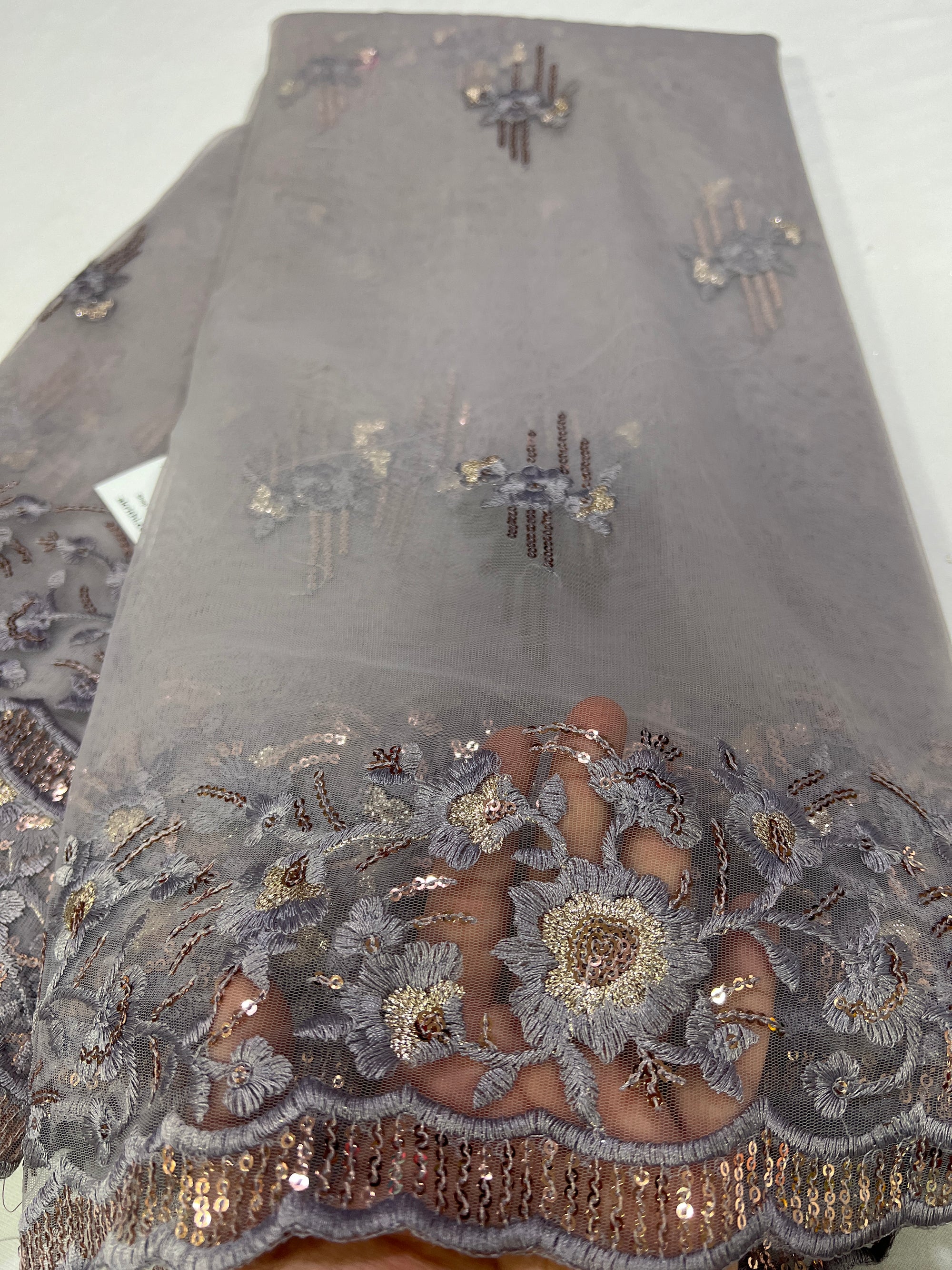 Embroidery on net fabric