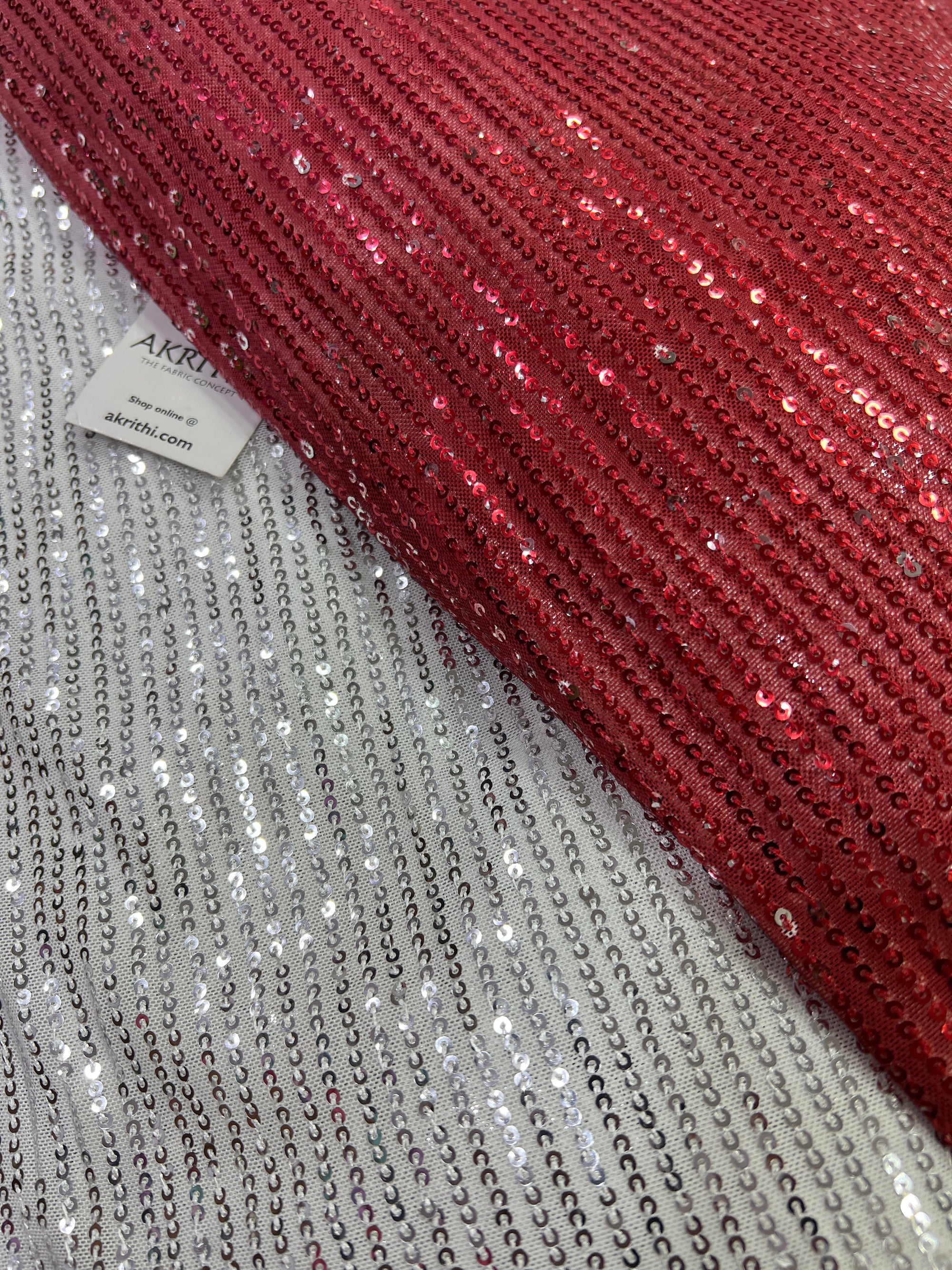 Sequins on shaded net fabric