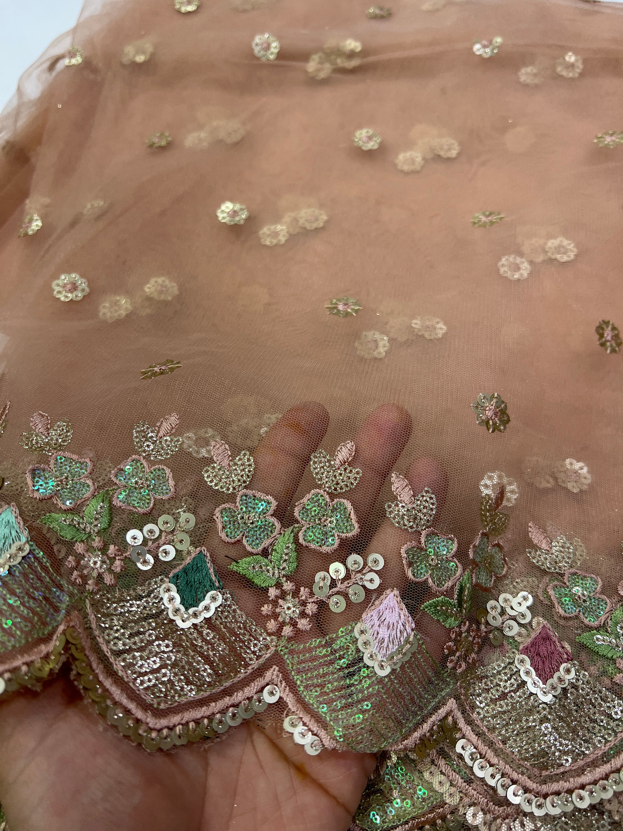 Embroidery on net fabric