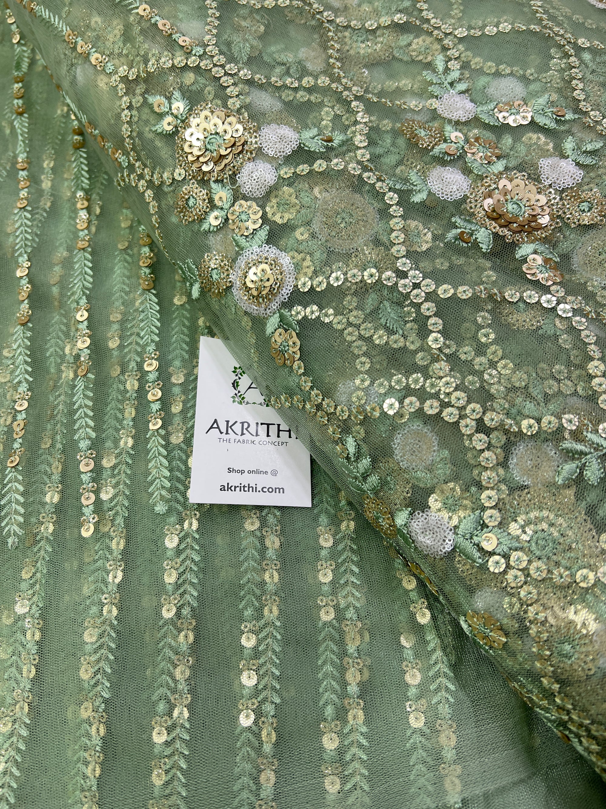 Embroidery on net fabric