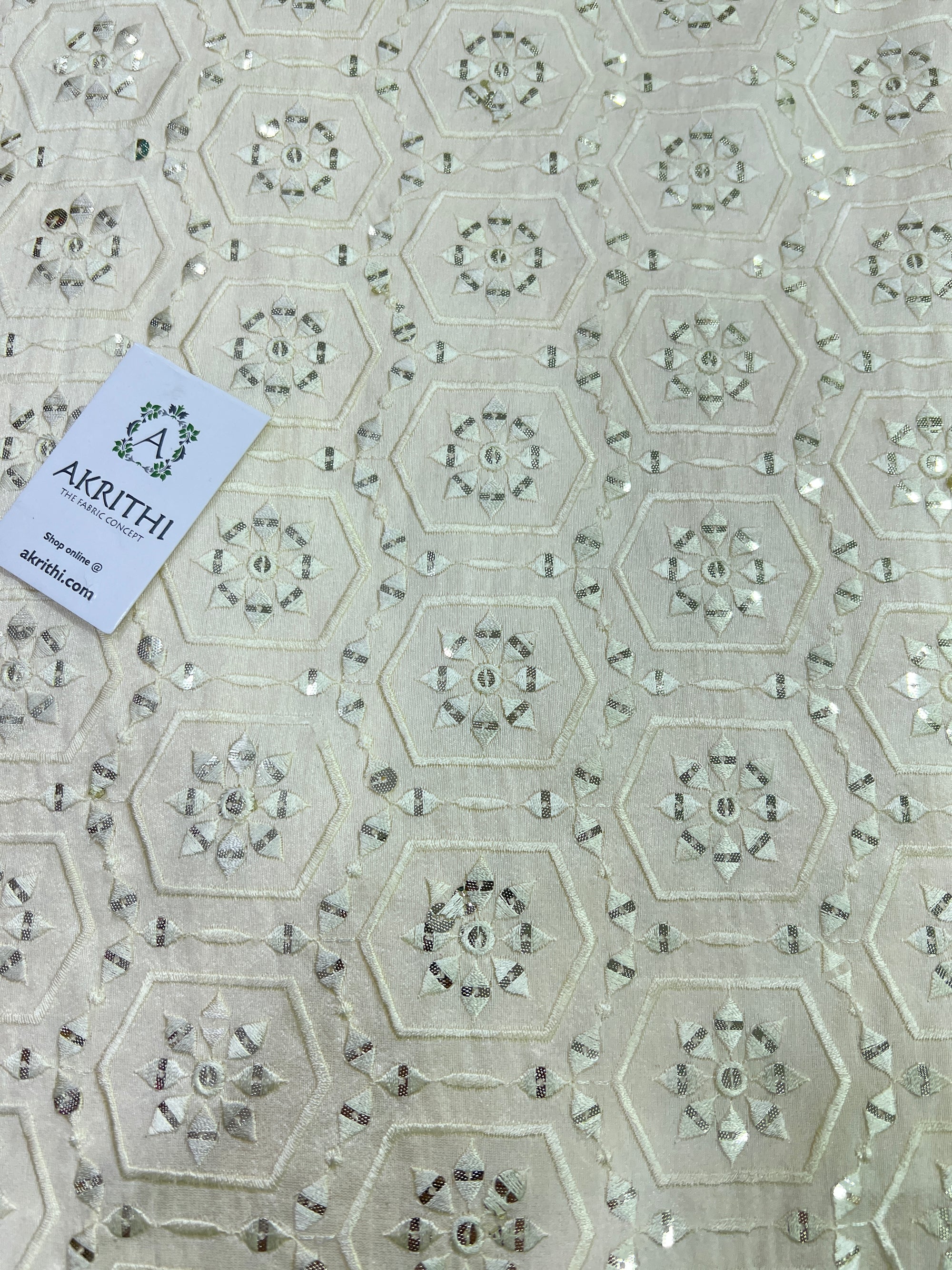 Embroidery on raw silk fabric