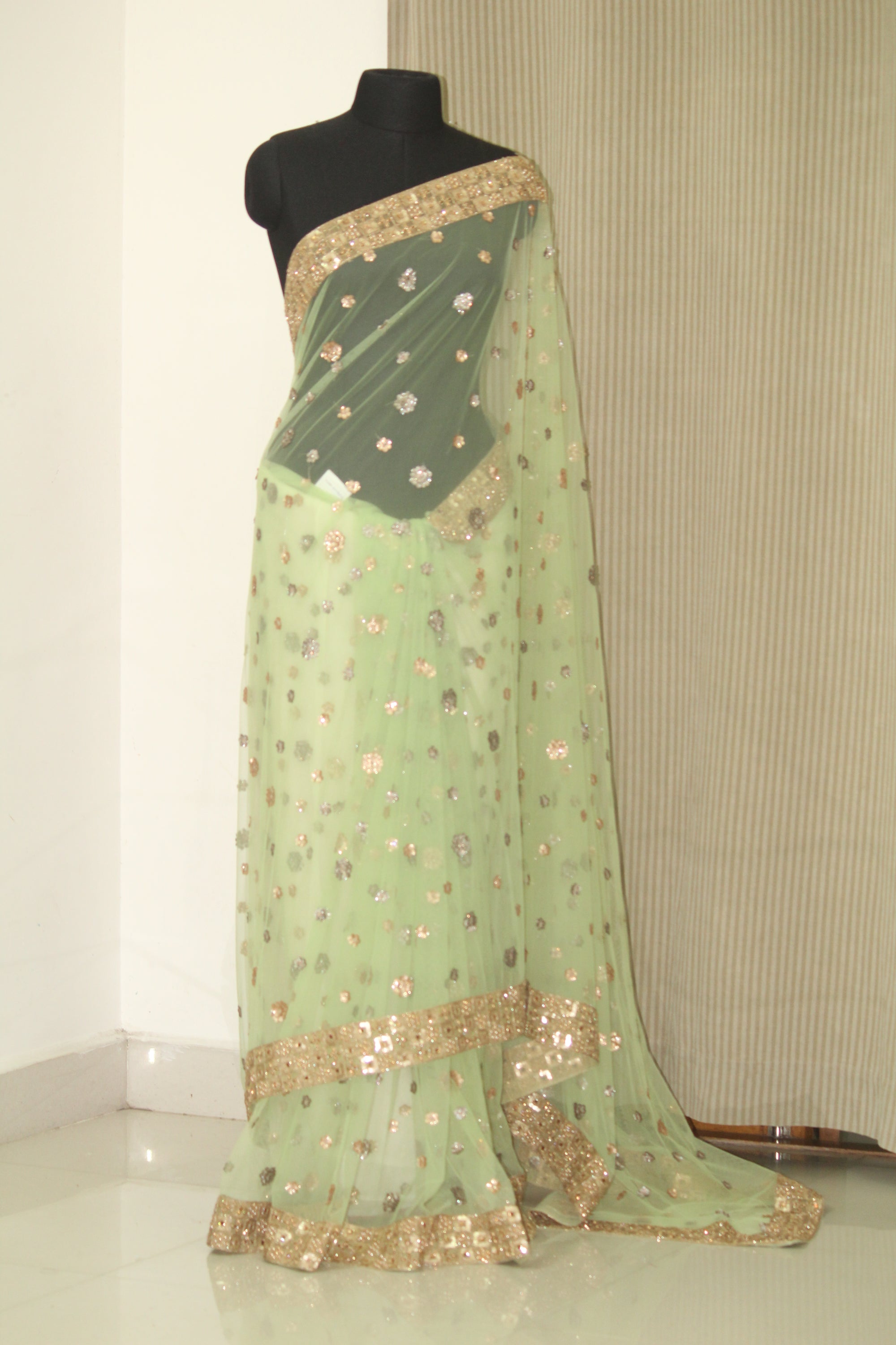 Green net butti saree