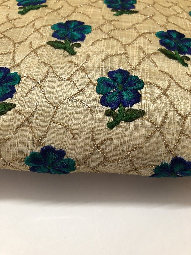 Thread and sequins embroidery on beige raw silk blouse