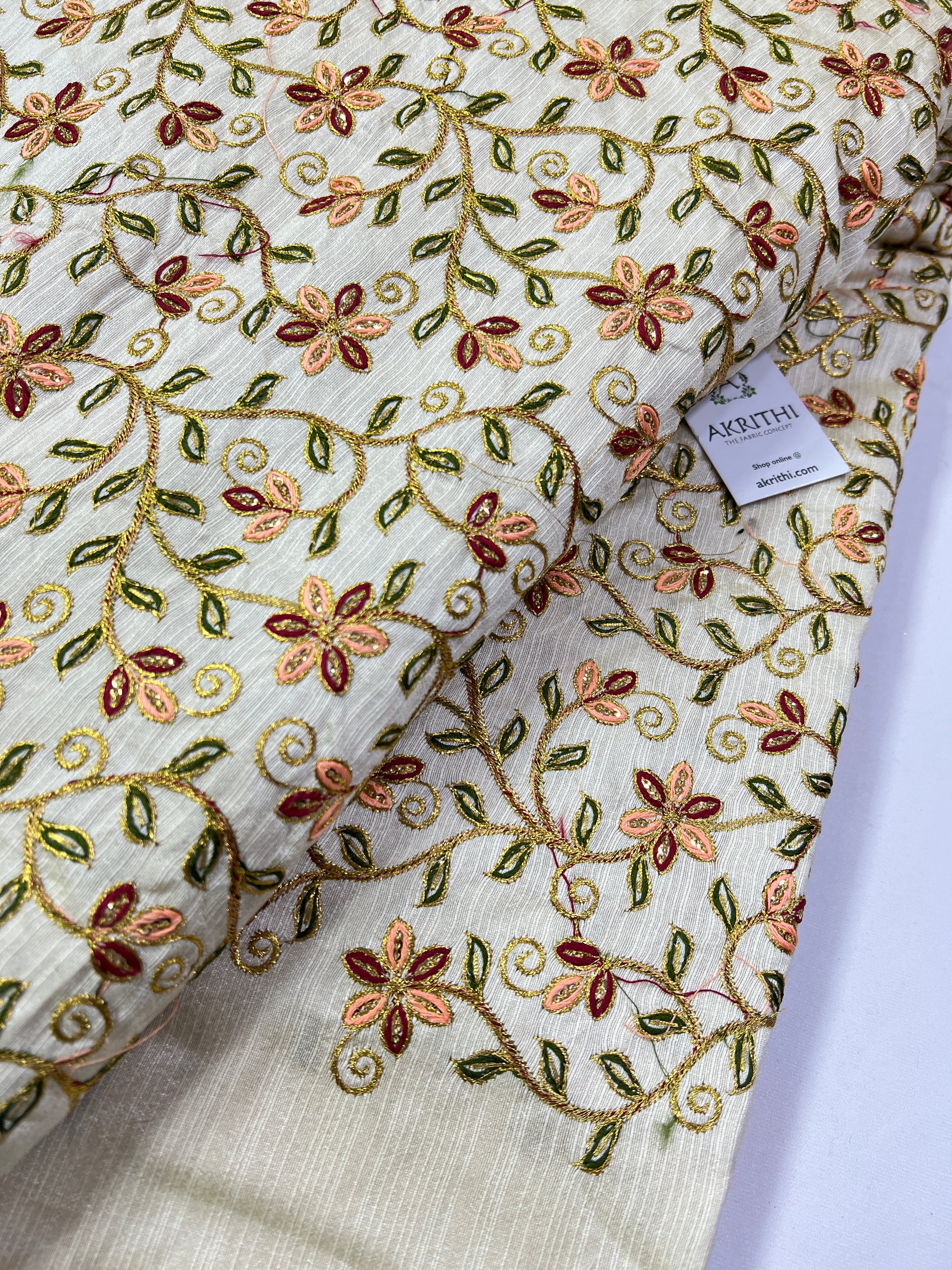 Embroidery on raw silk fabric