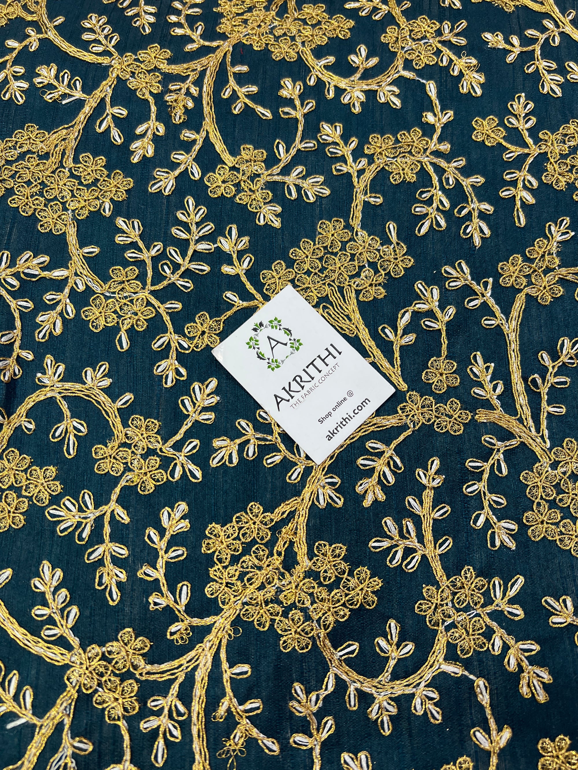 Embroidery on raw silk fabric