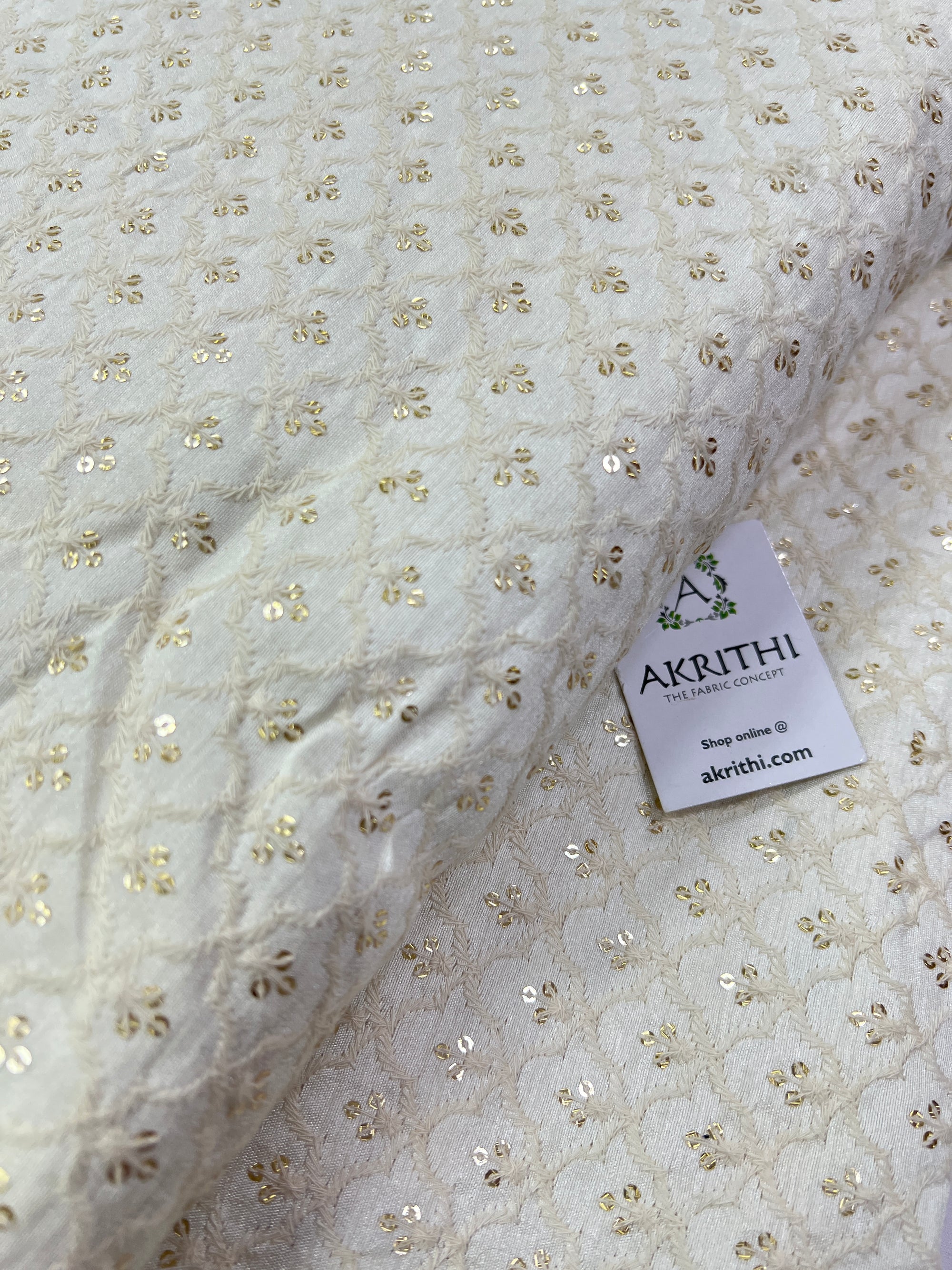 Embroidery on raw silk fabric