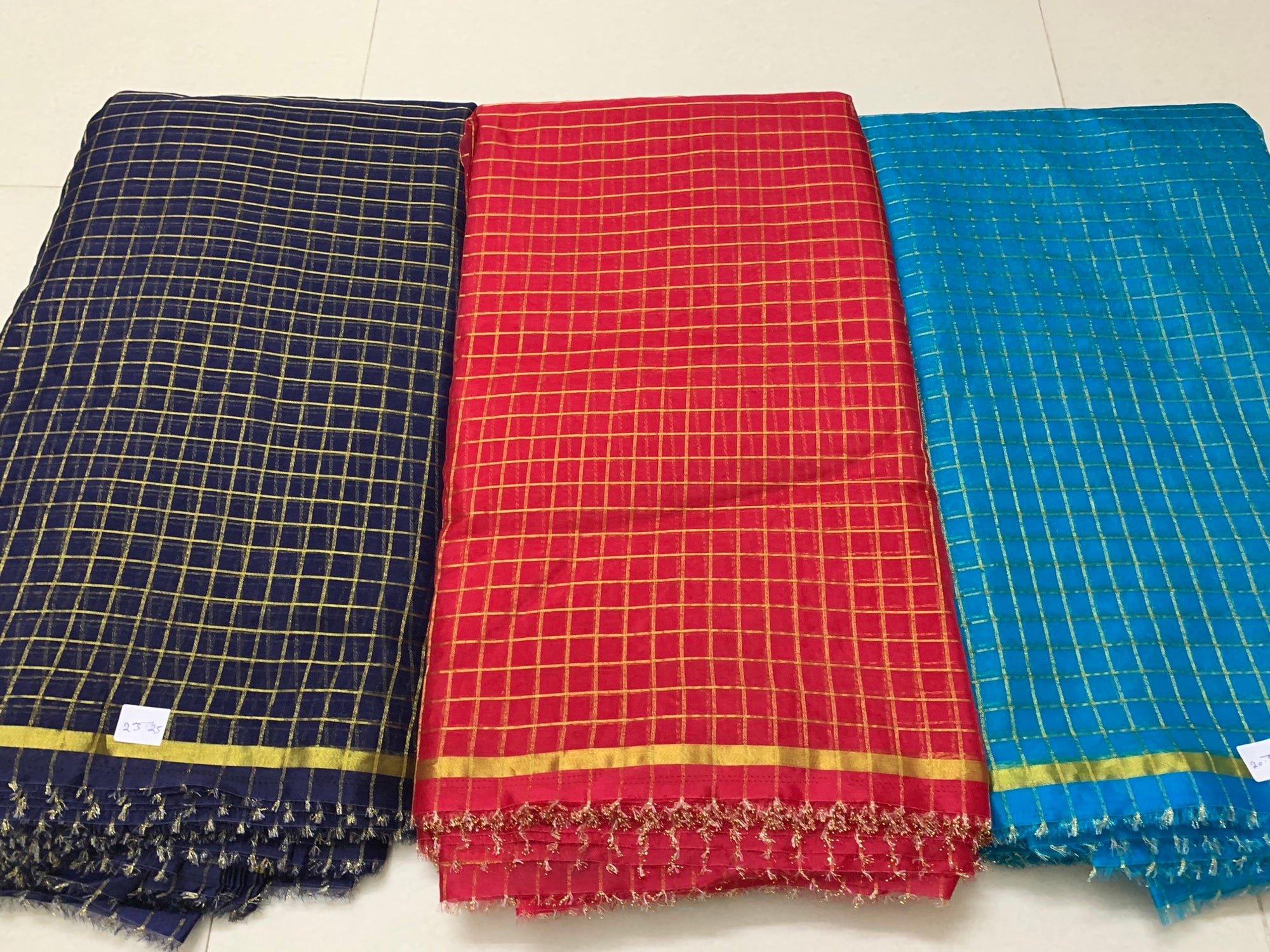 Zari checks organza fabric