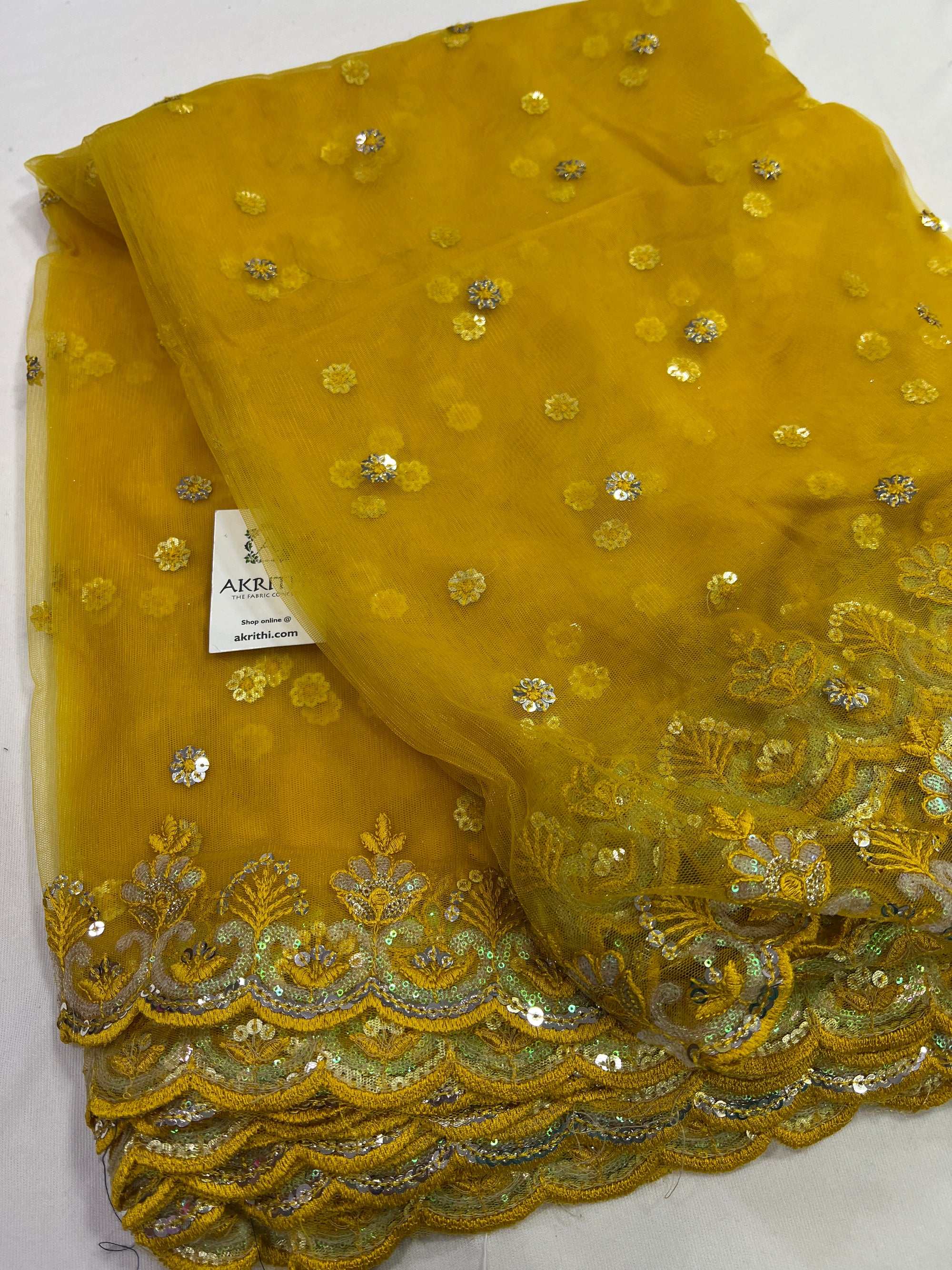 Embroidery on net fabric