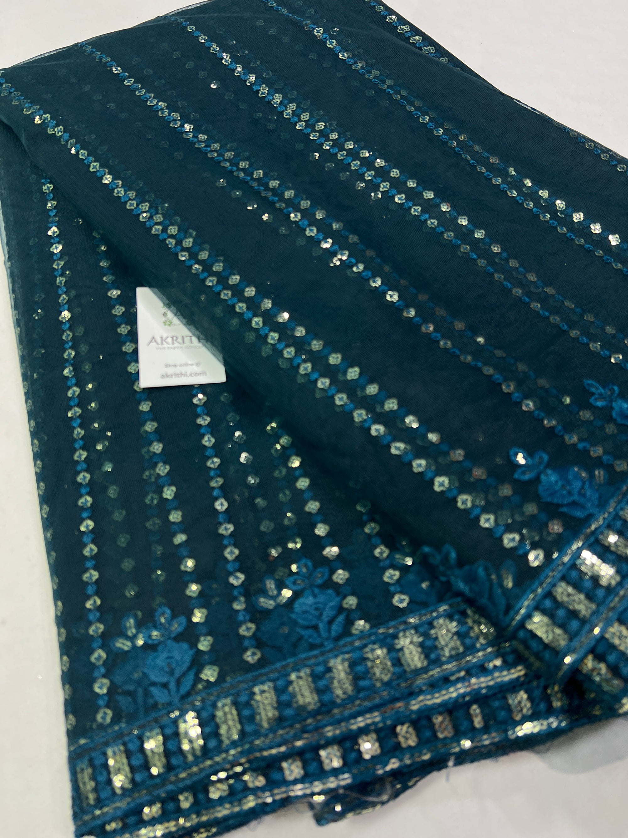Embroidery on net fabric