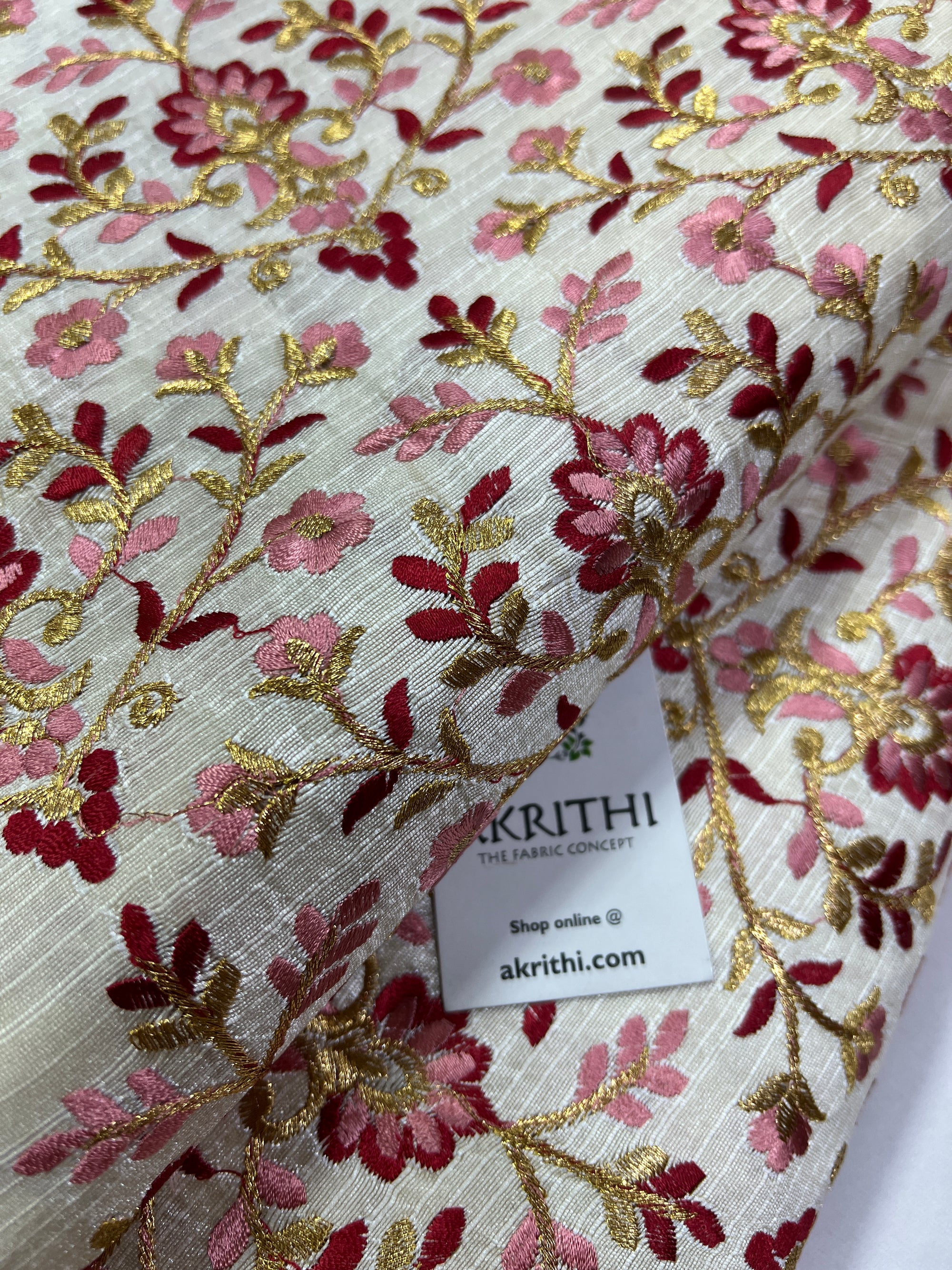 Embroidery on raw silk fabric