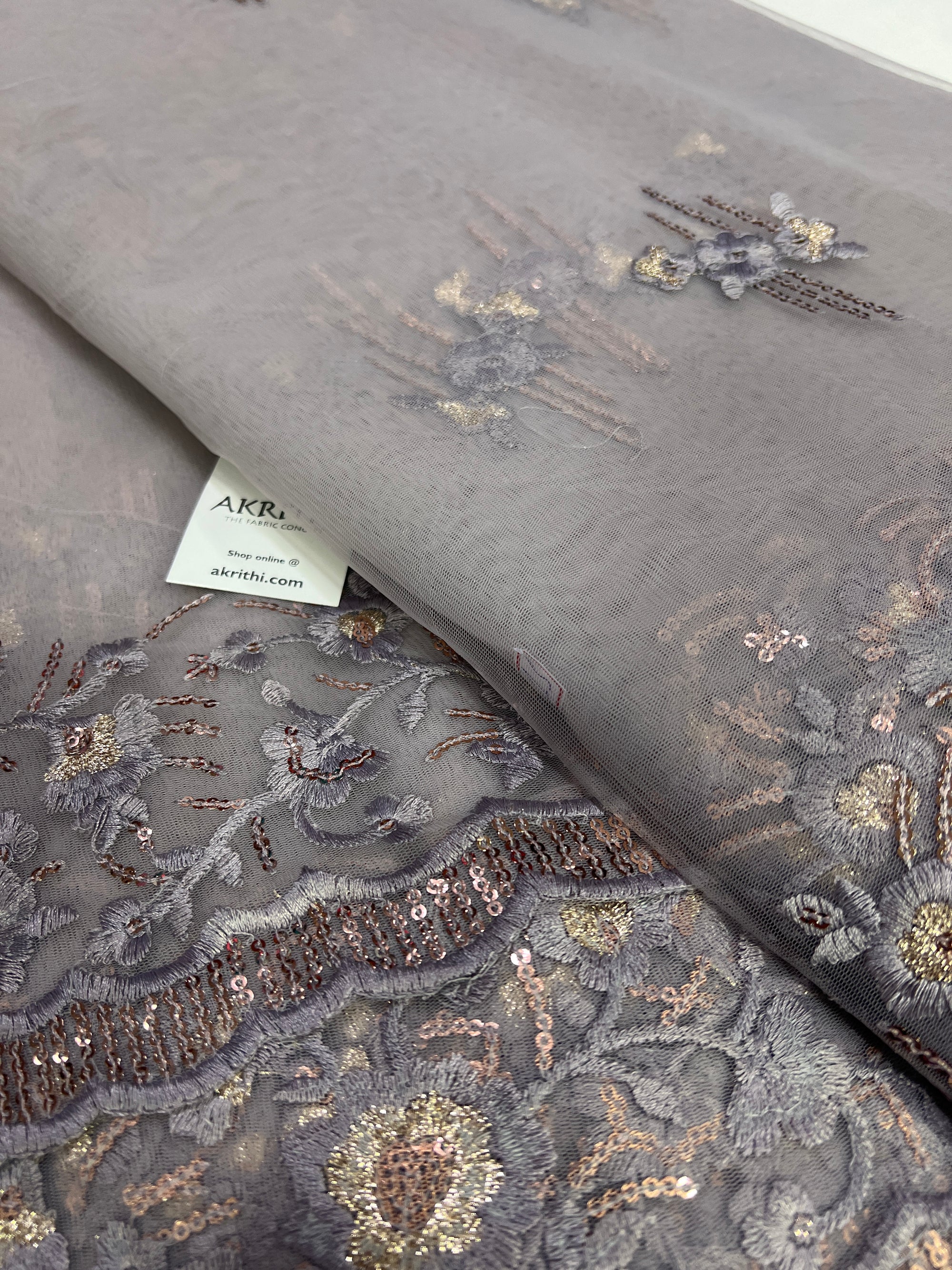 Embroidery on net fabric