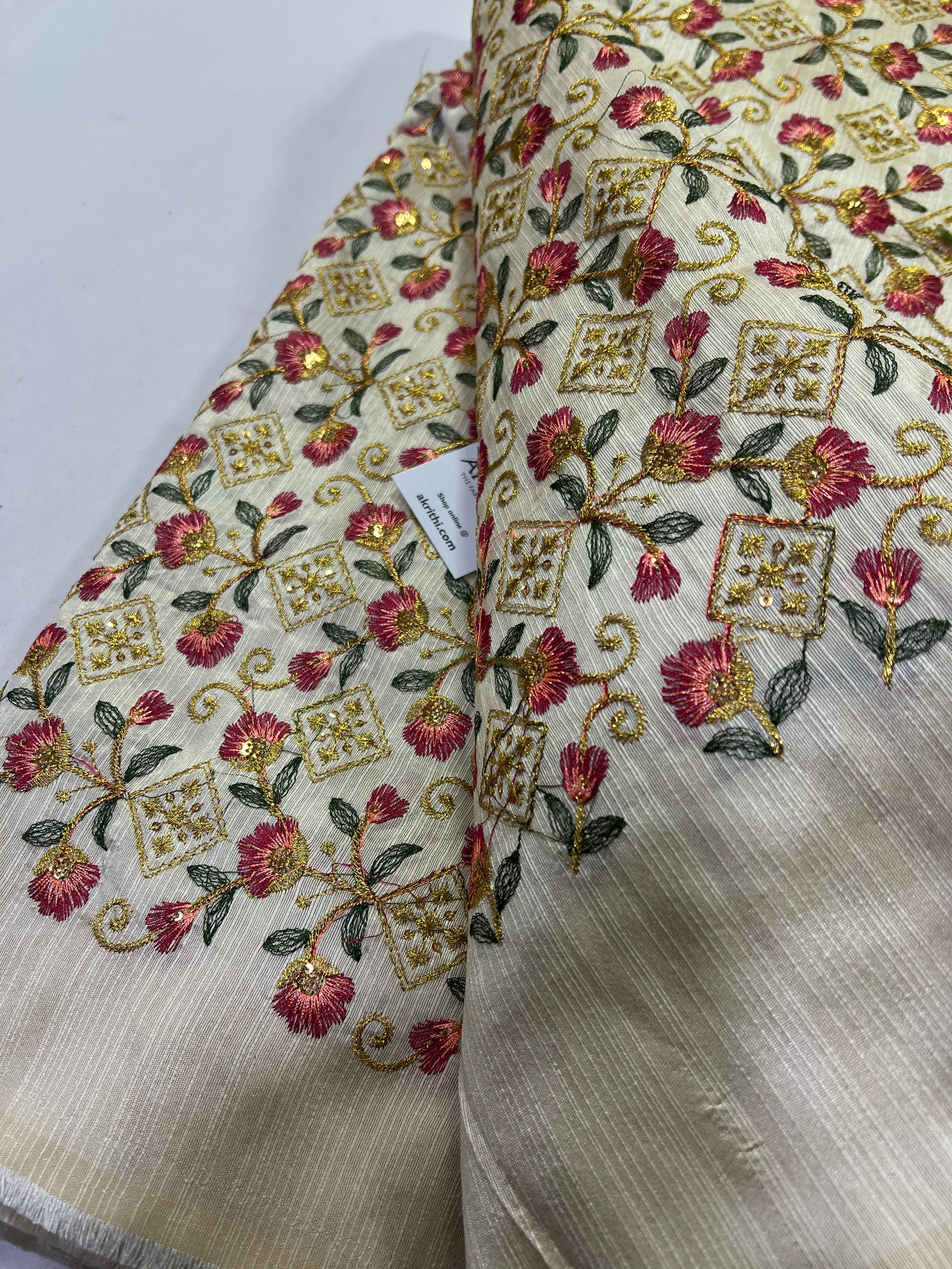 Embroidery on raw silk fabric
