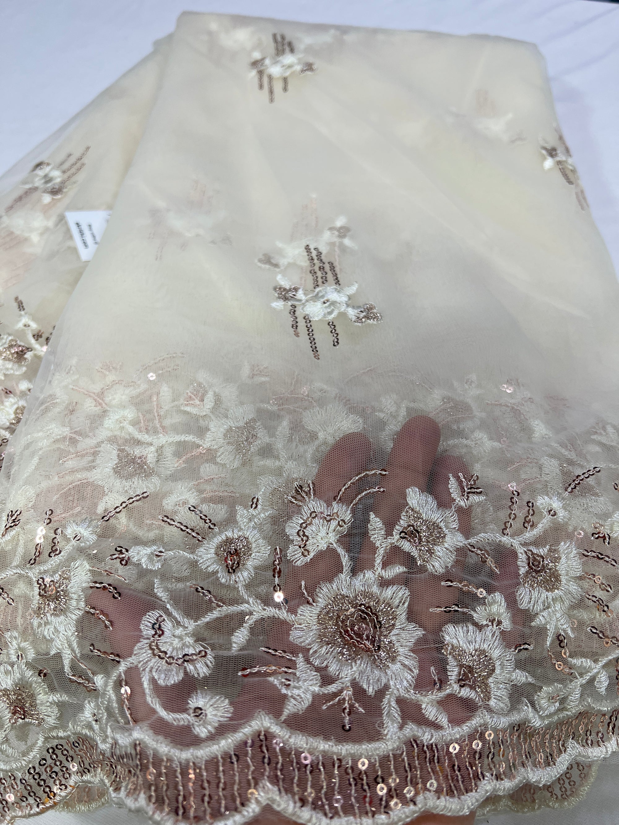 Embroidery on net fabric