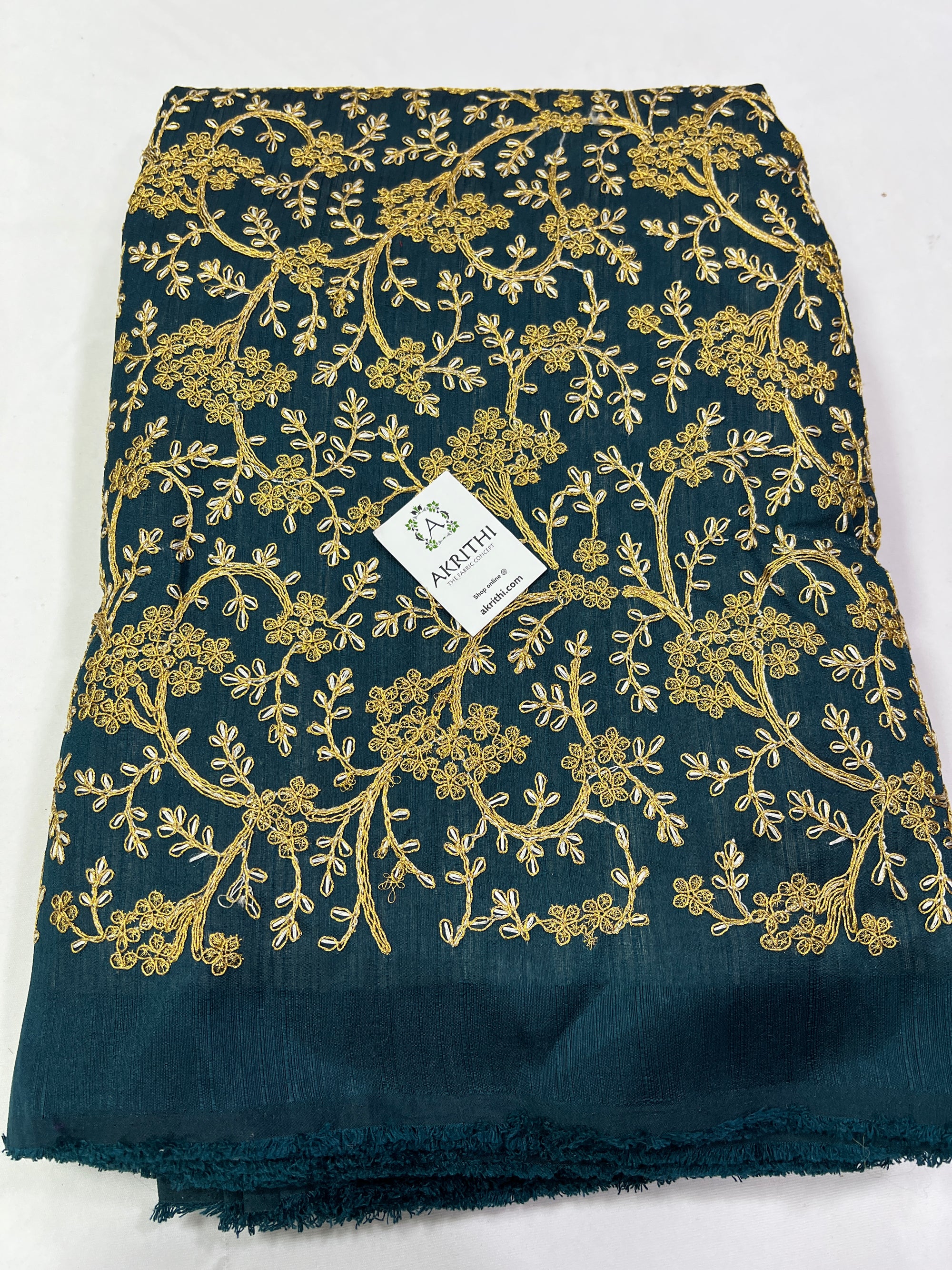 Embroidery on raw silk fabric