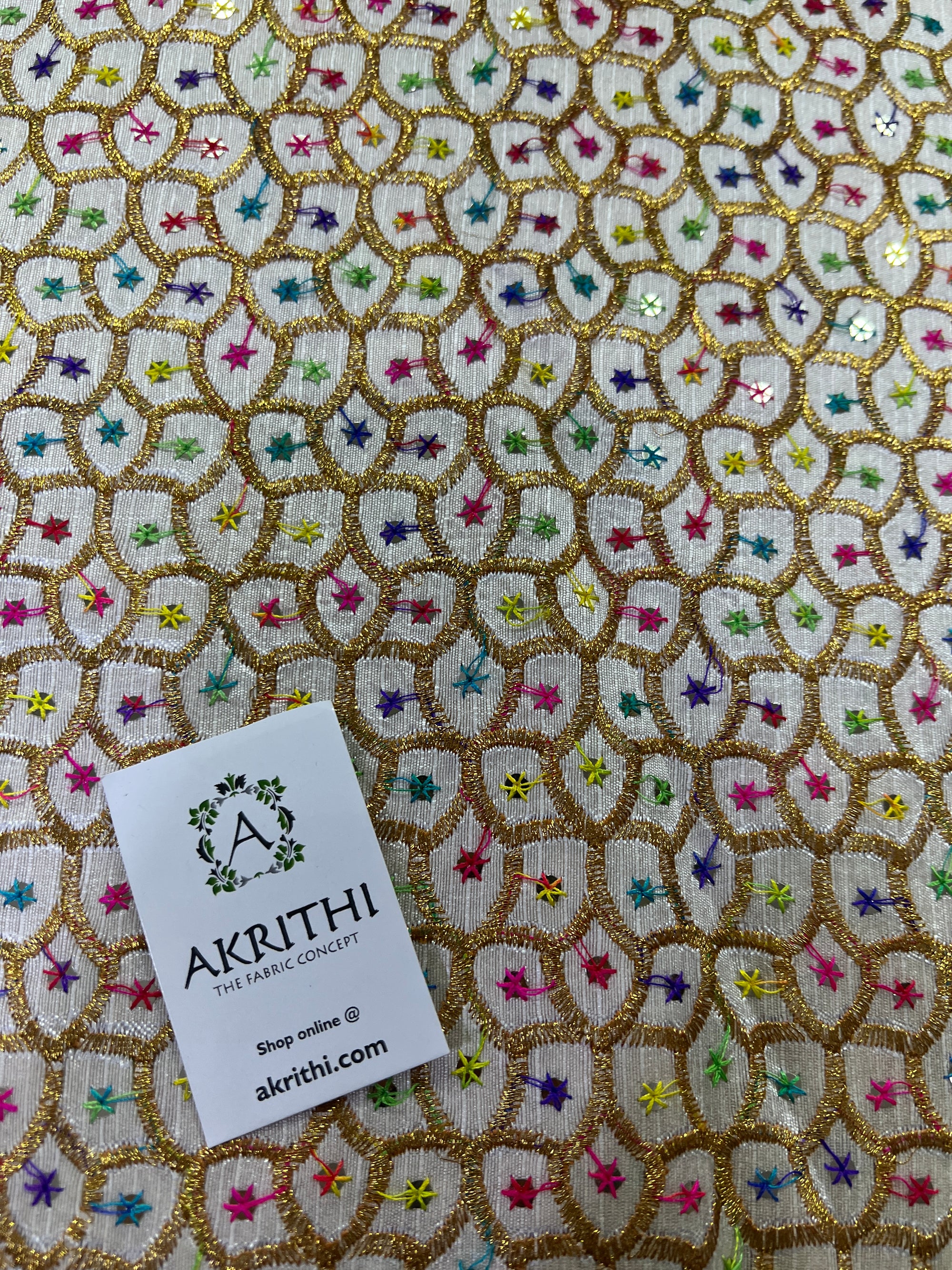 Embroidery on raw silk fabric