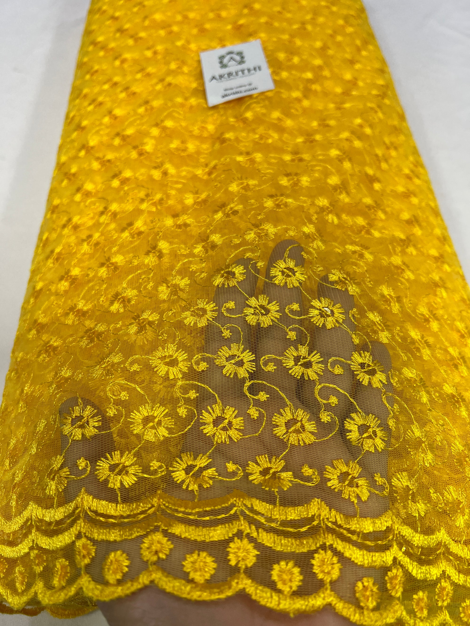 Embroidery on net fabric