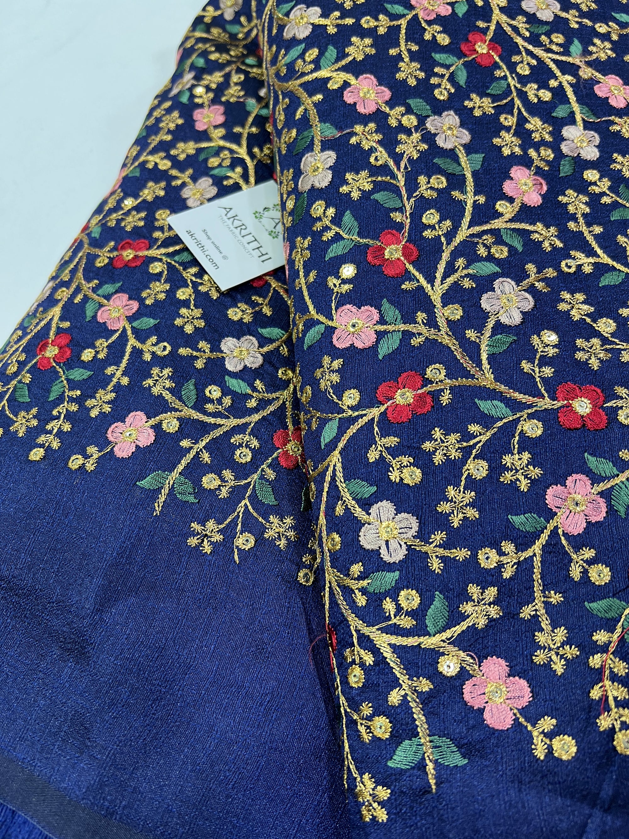 Embroidery on raw silk fabric