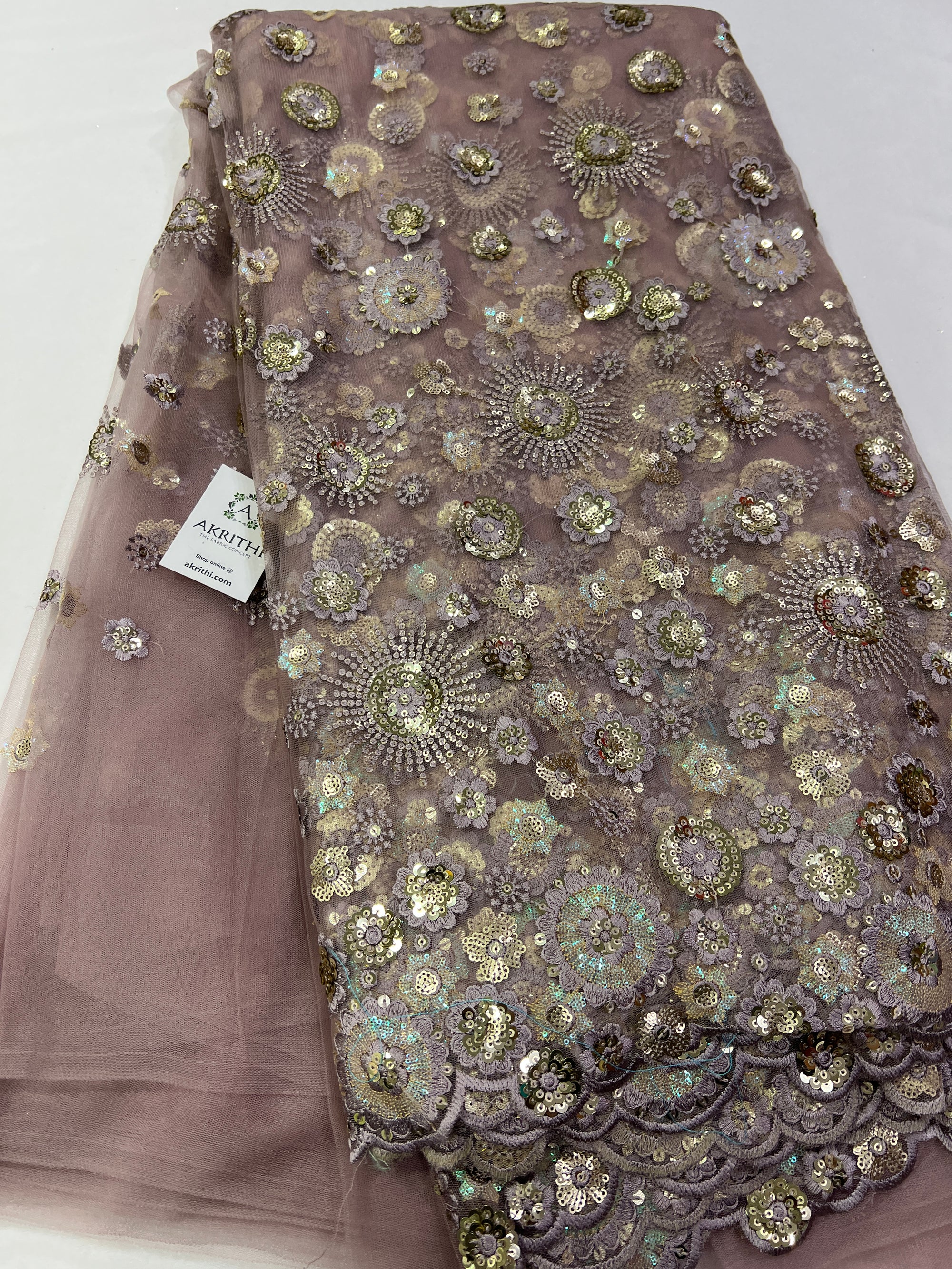 Embroidery on net fabric