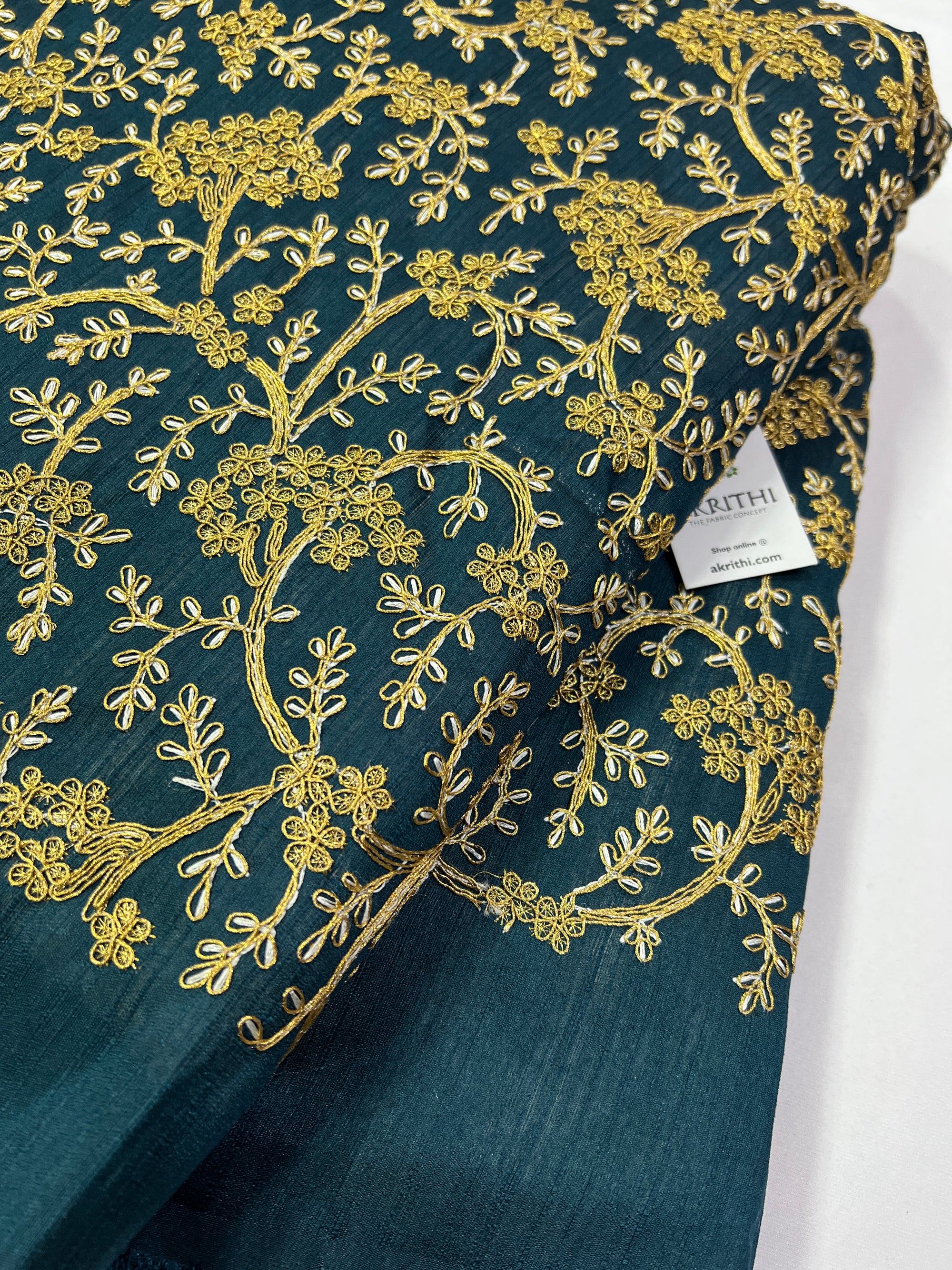 Embroidery on raw silk fabric