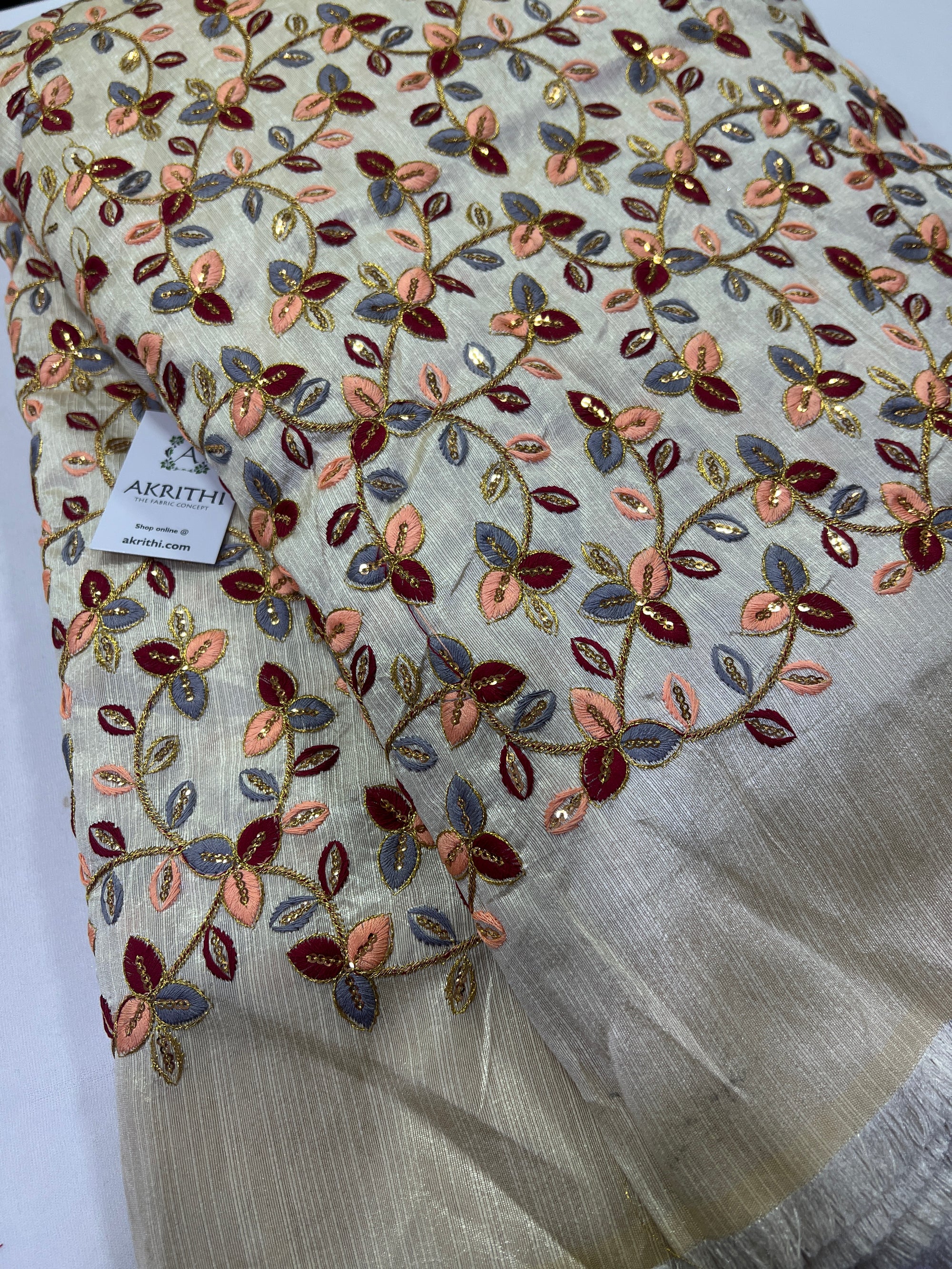 Embroidery on raw silk fabric