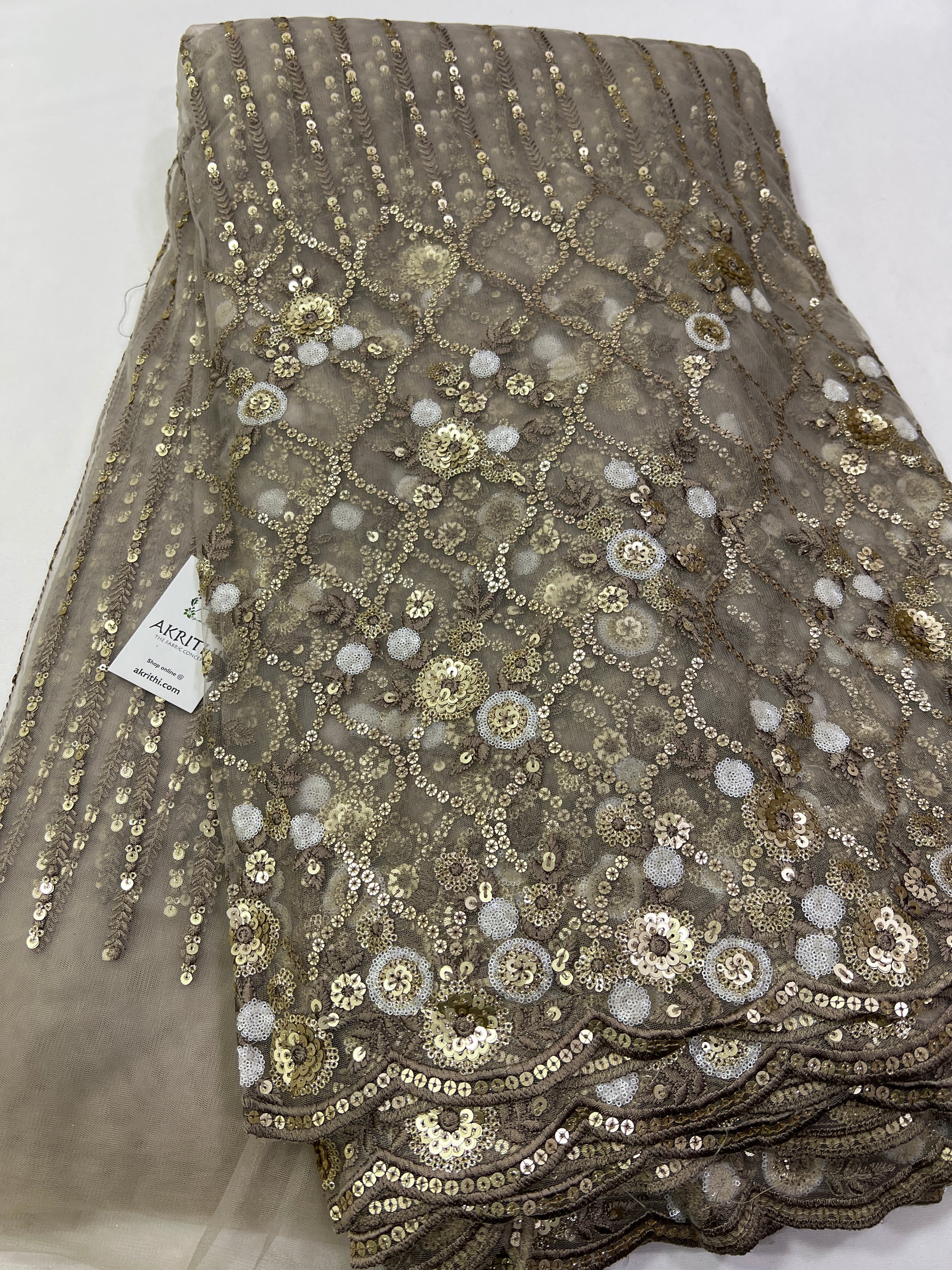 Embroidery on net fabric