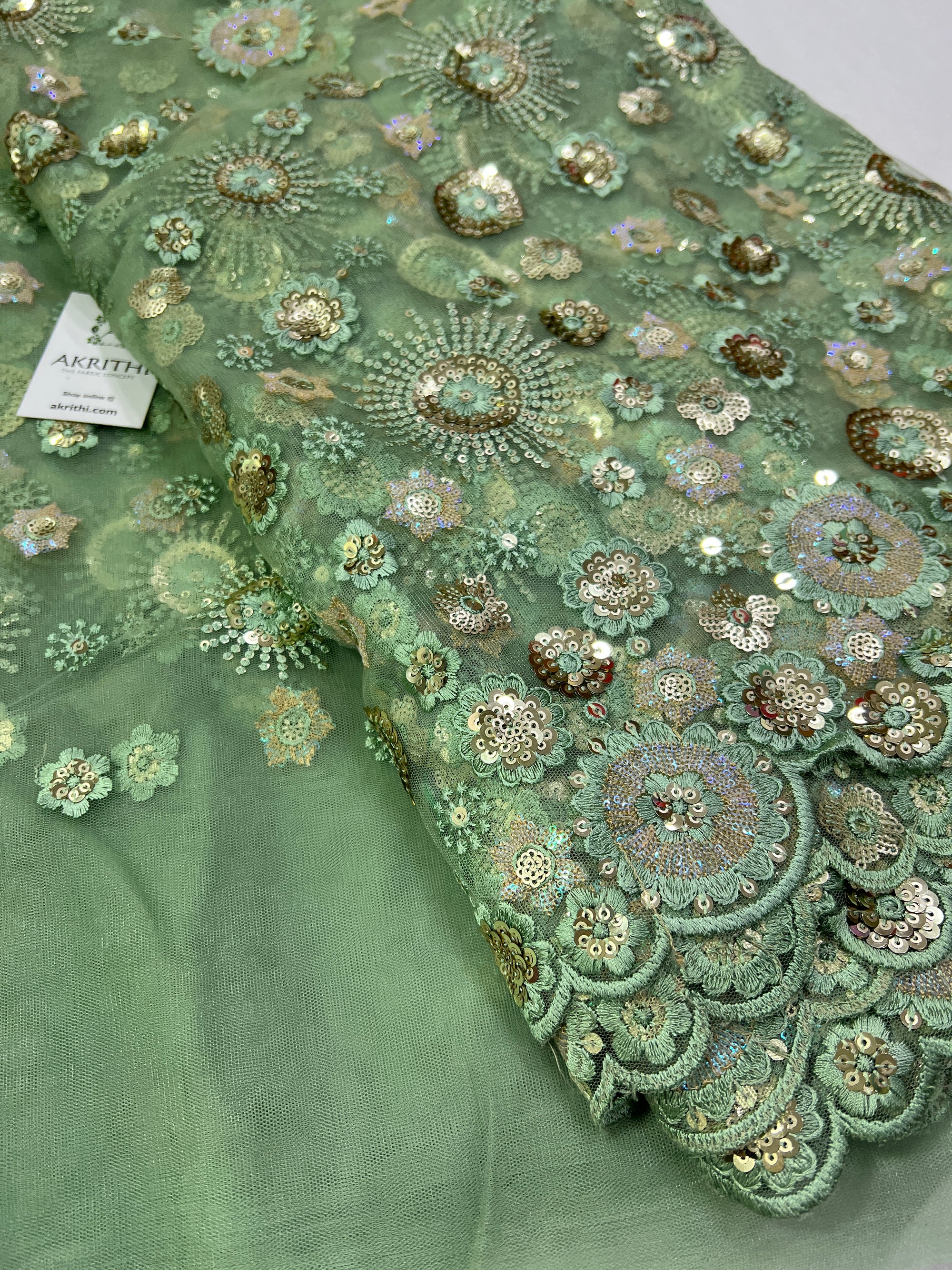 Embroidery on net fabric