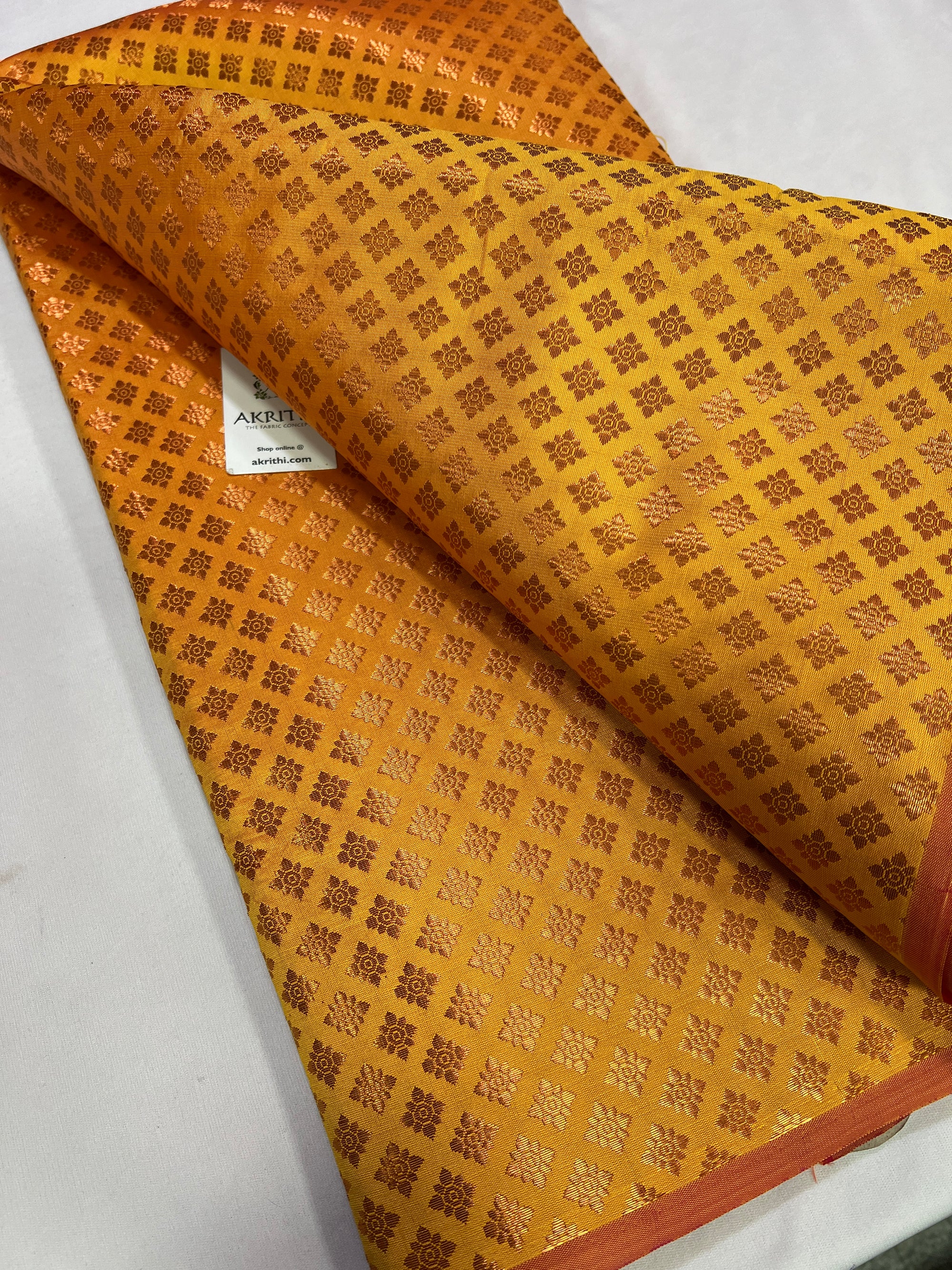 Banarasi brocade fabric with copper zari