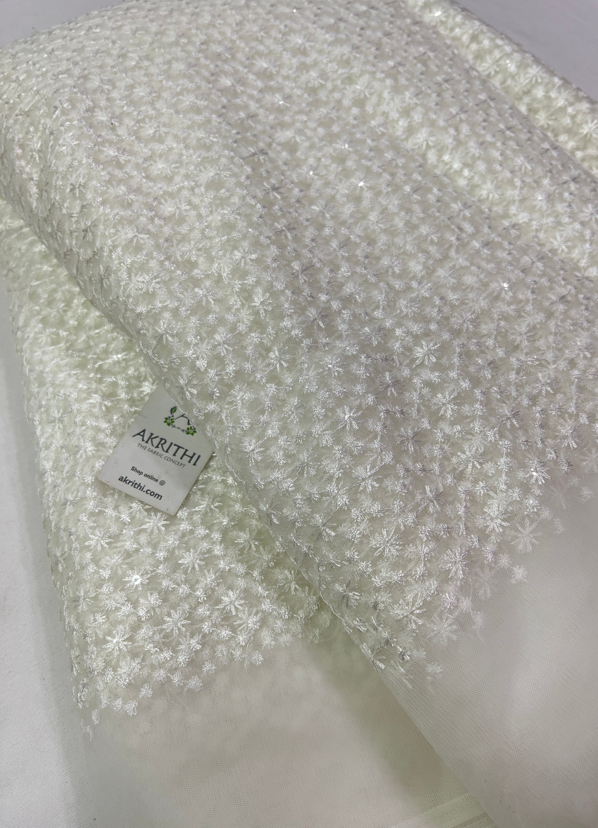 Embroidery on net fabric