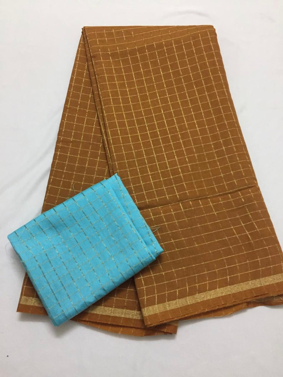 Silk zari checks saree with contrast blouse