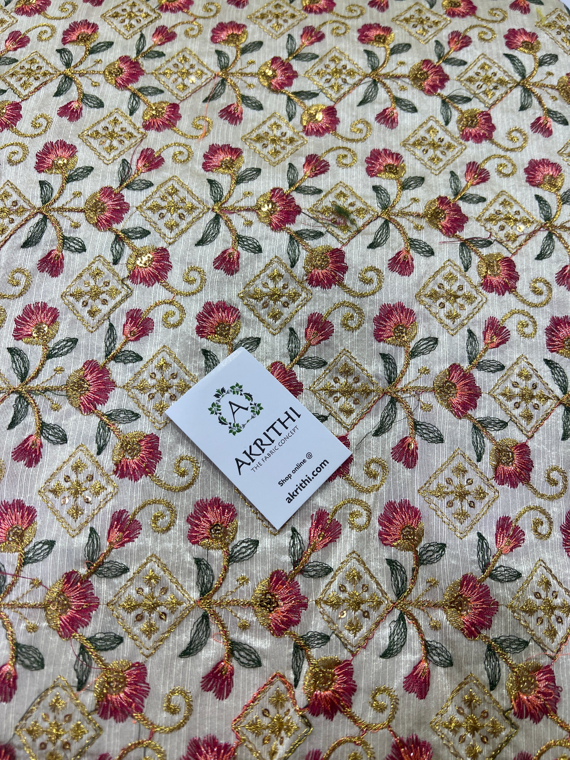 Embroidery on raw silk fabric