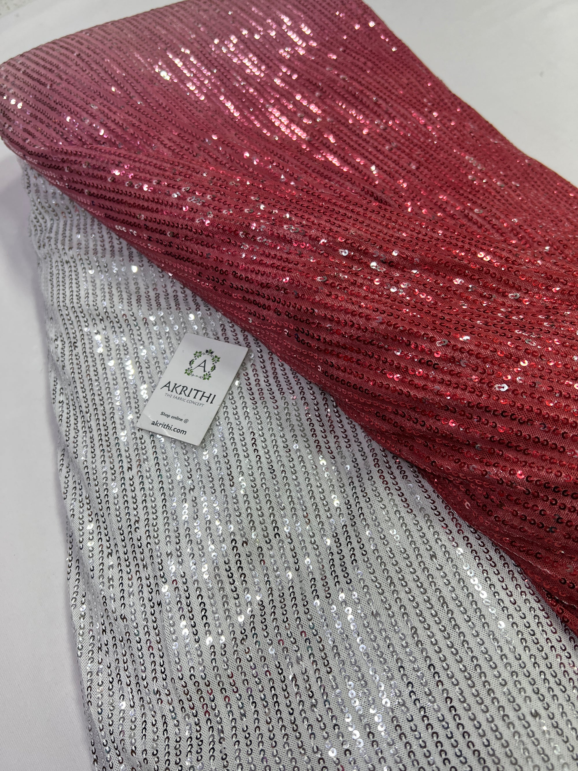 Sequins on shaded net fabric