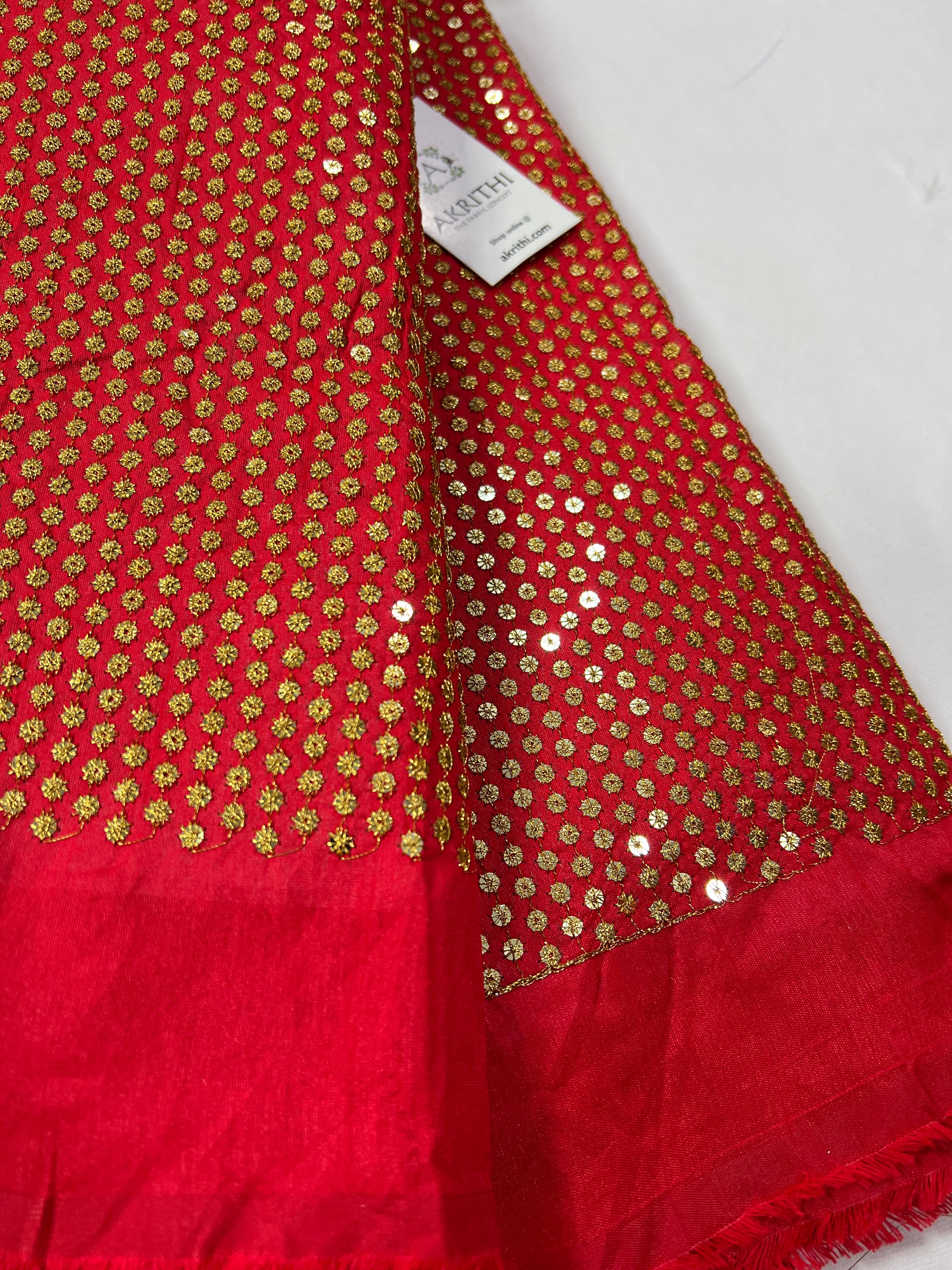 Embroidery on raw silk fabric