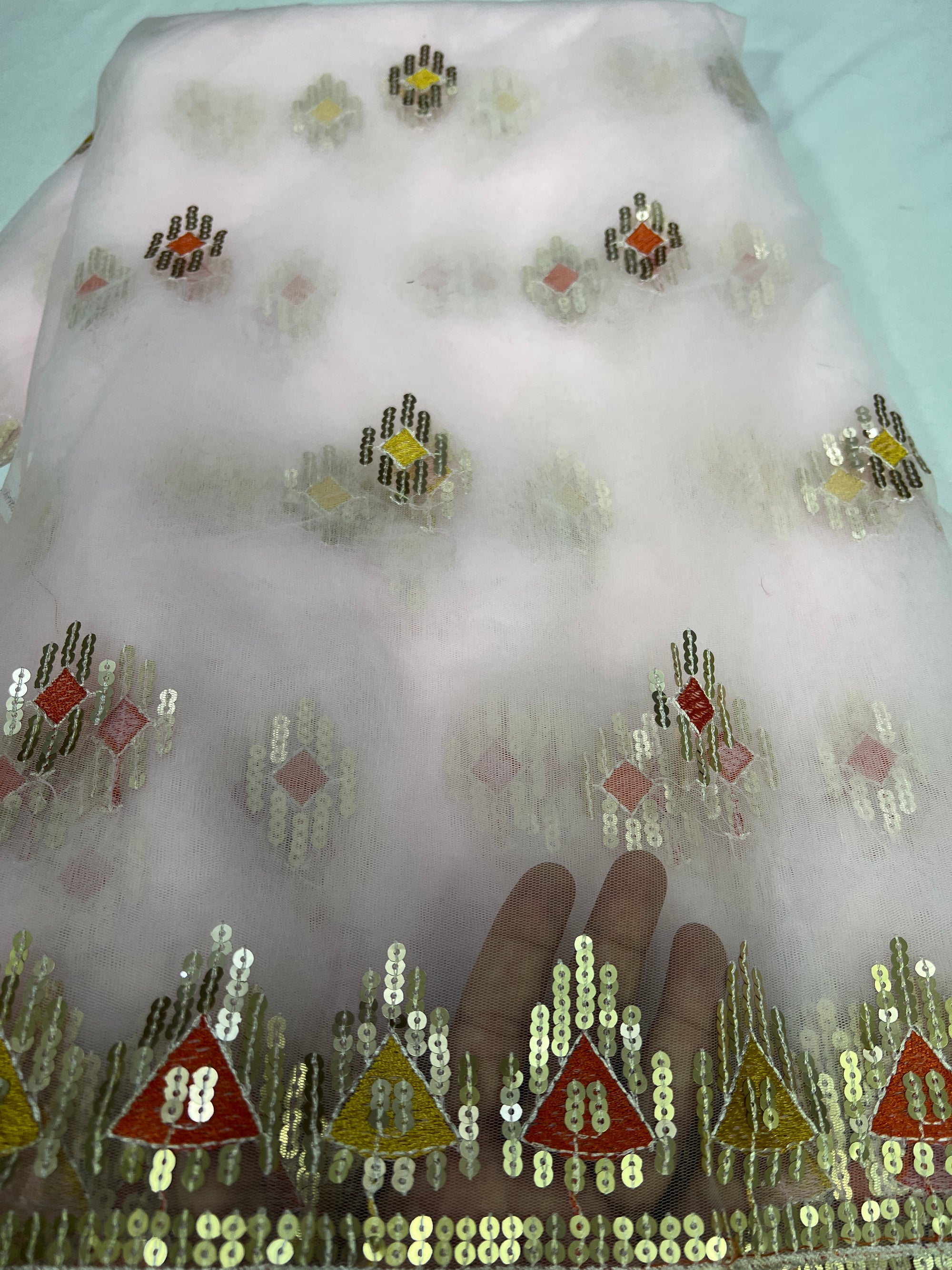 Embroidery on net fabric