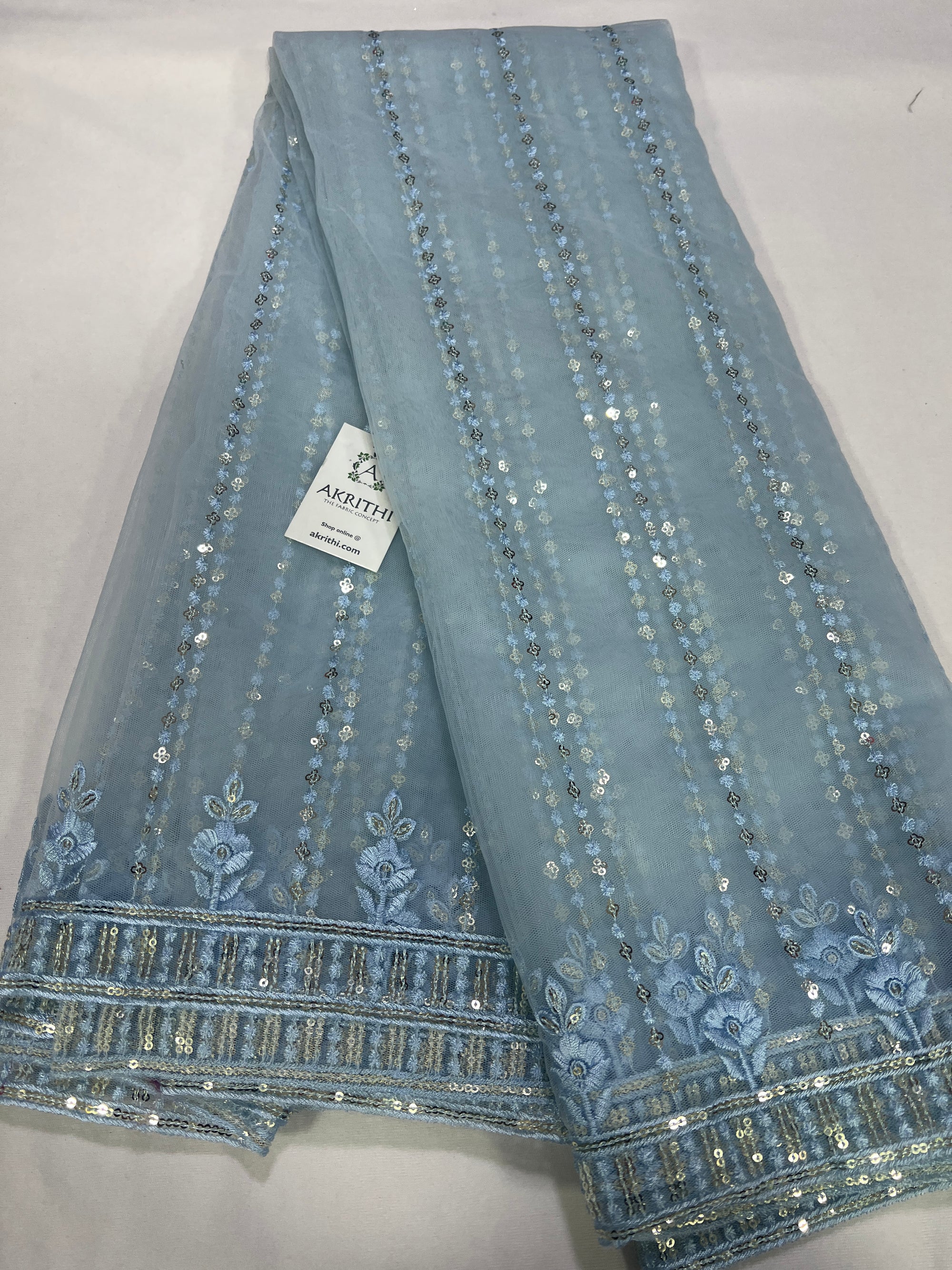 Embroidery on net fabric
