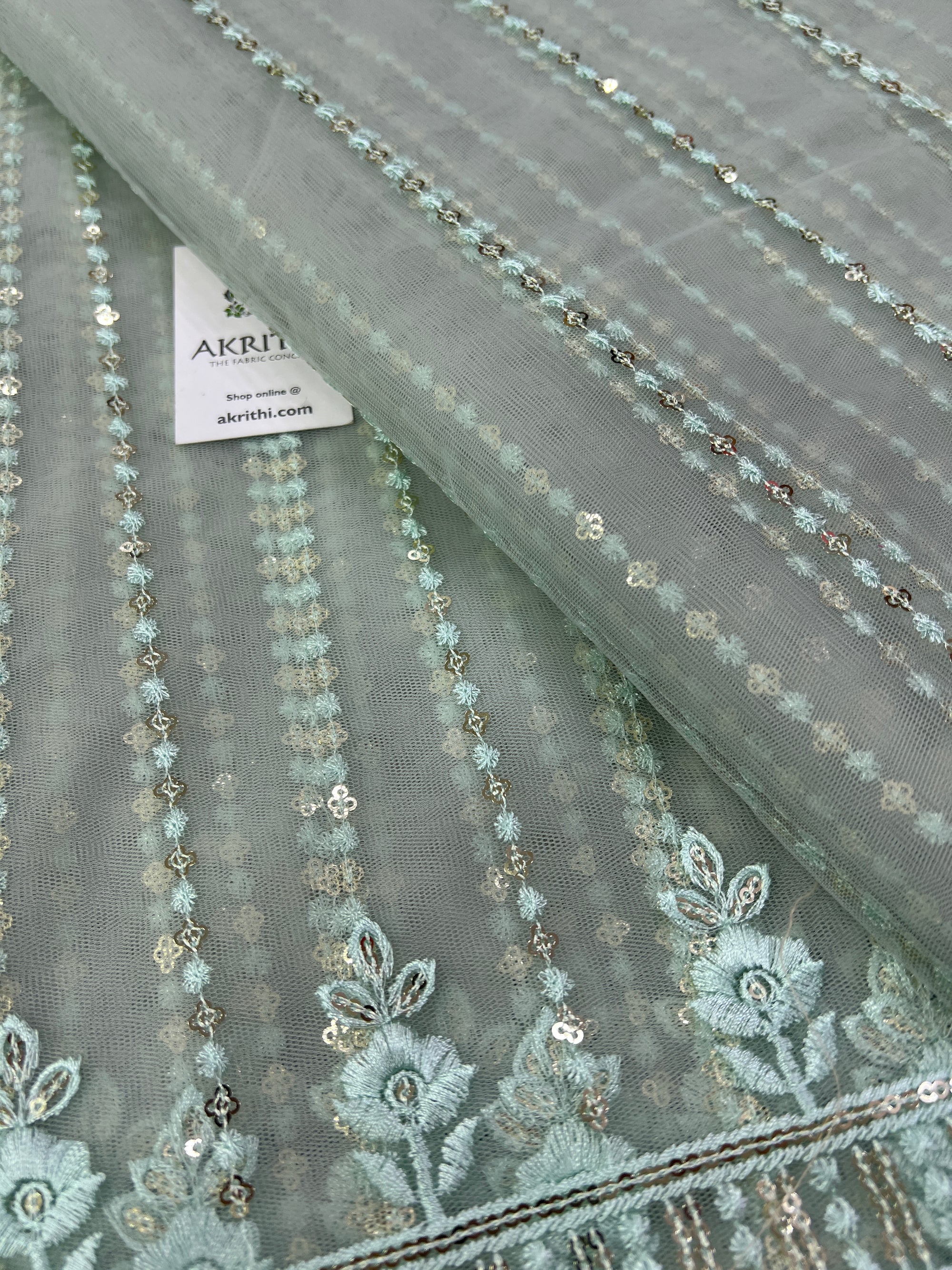 Embroidery on net fabric