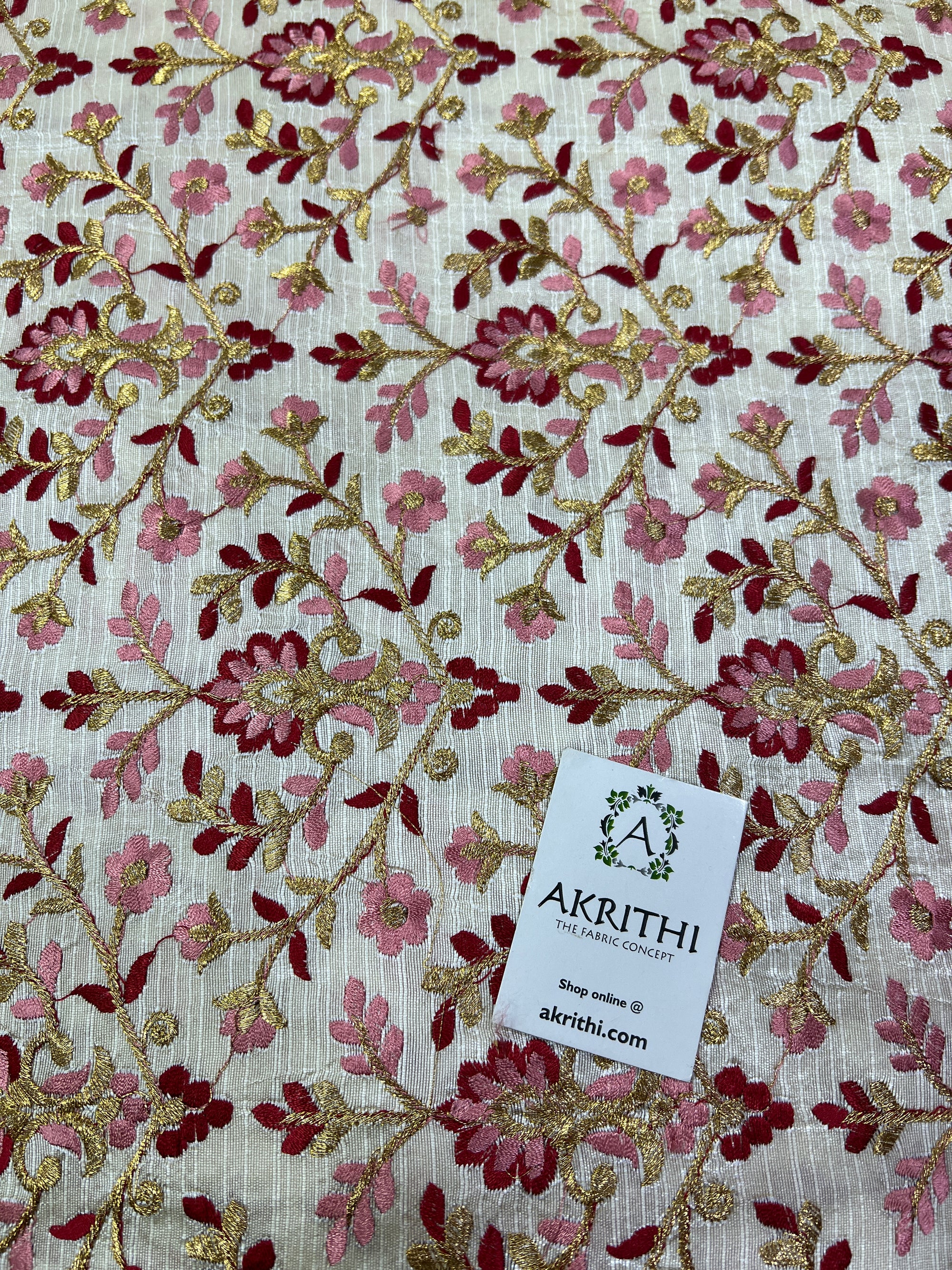 Embroidery on raw silk fabric