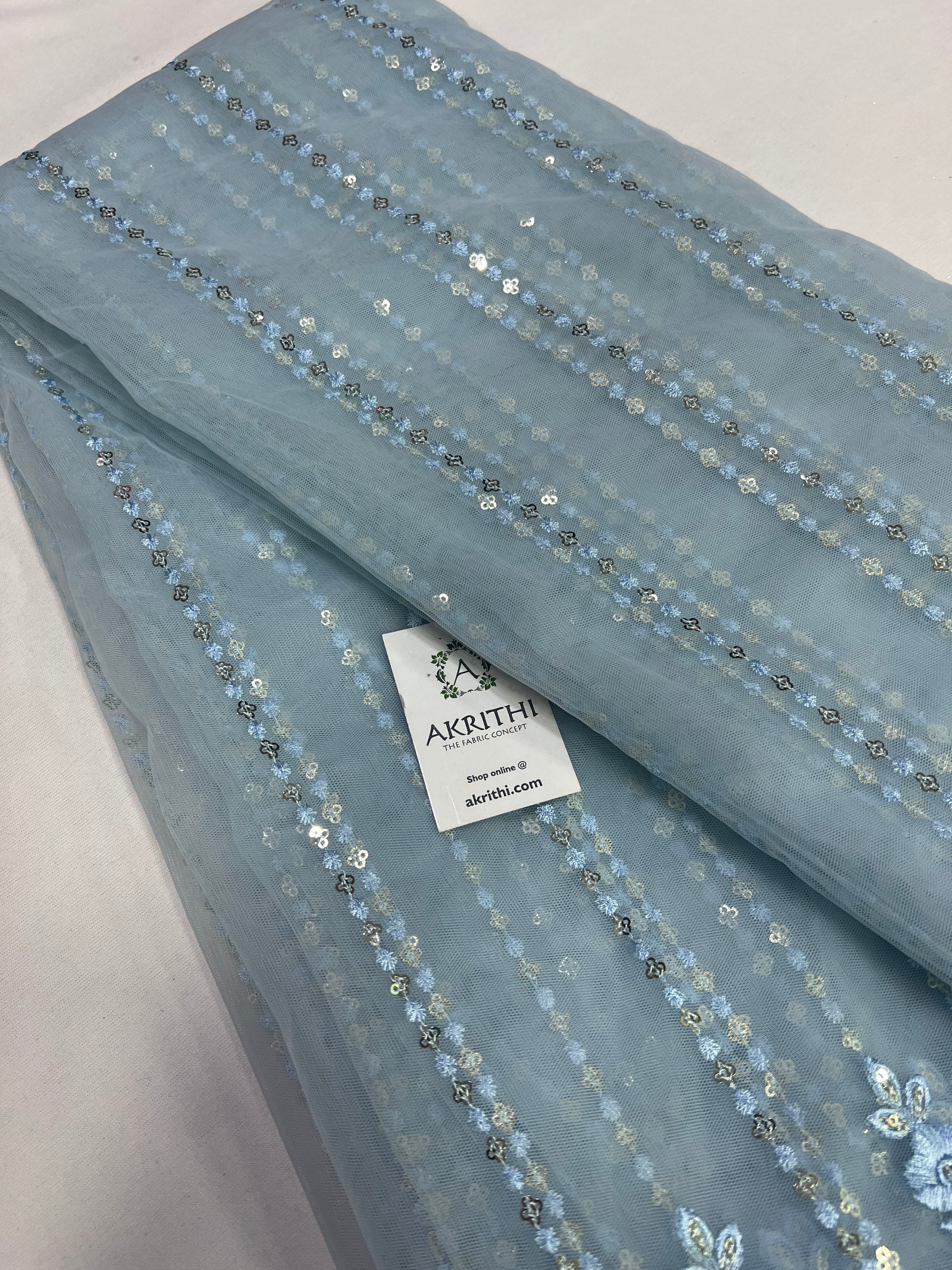 Embroidery on net fabric