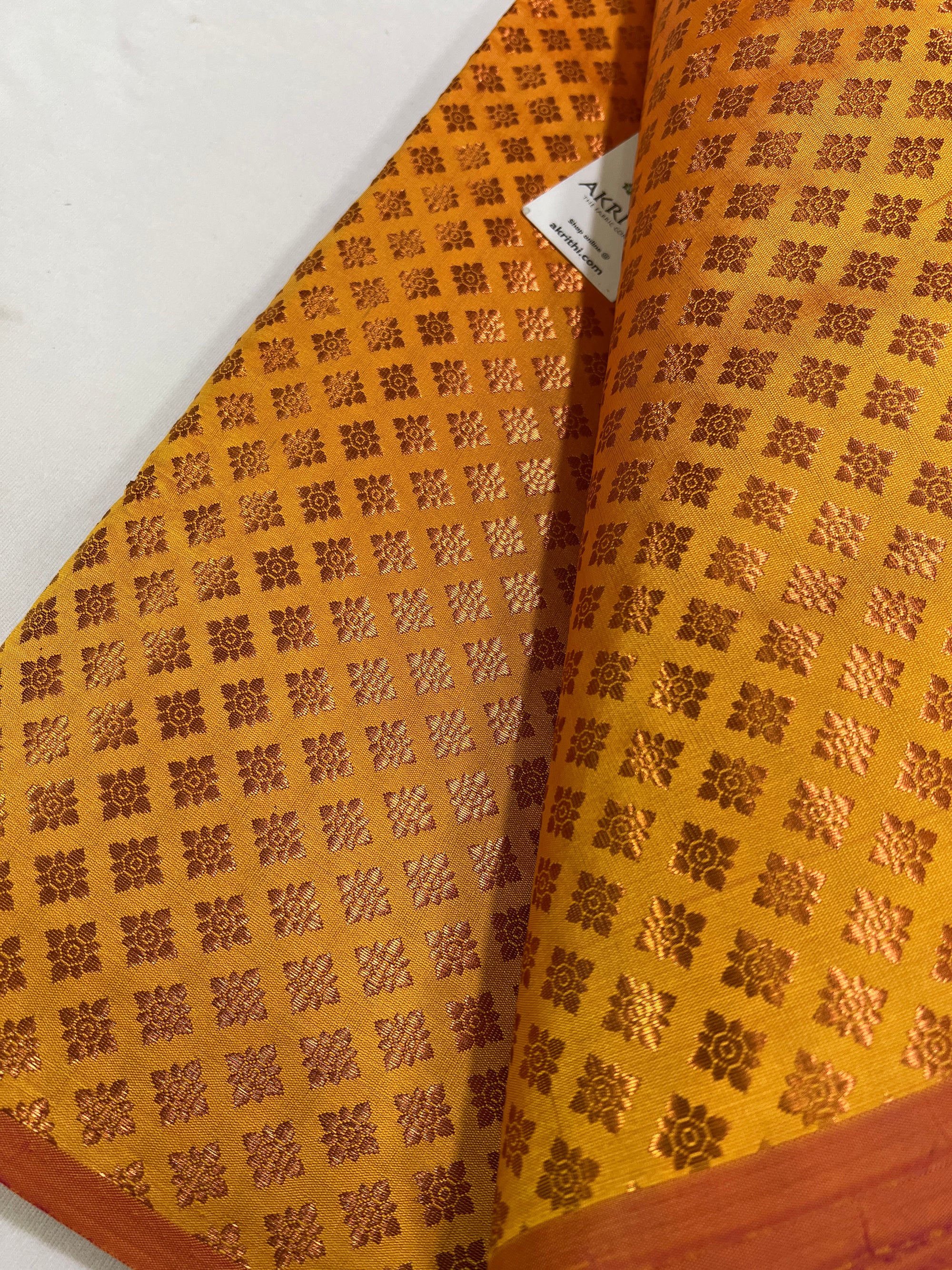 Banarasi brocade fabric with copper zari