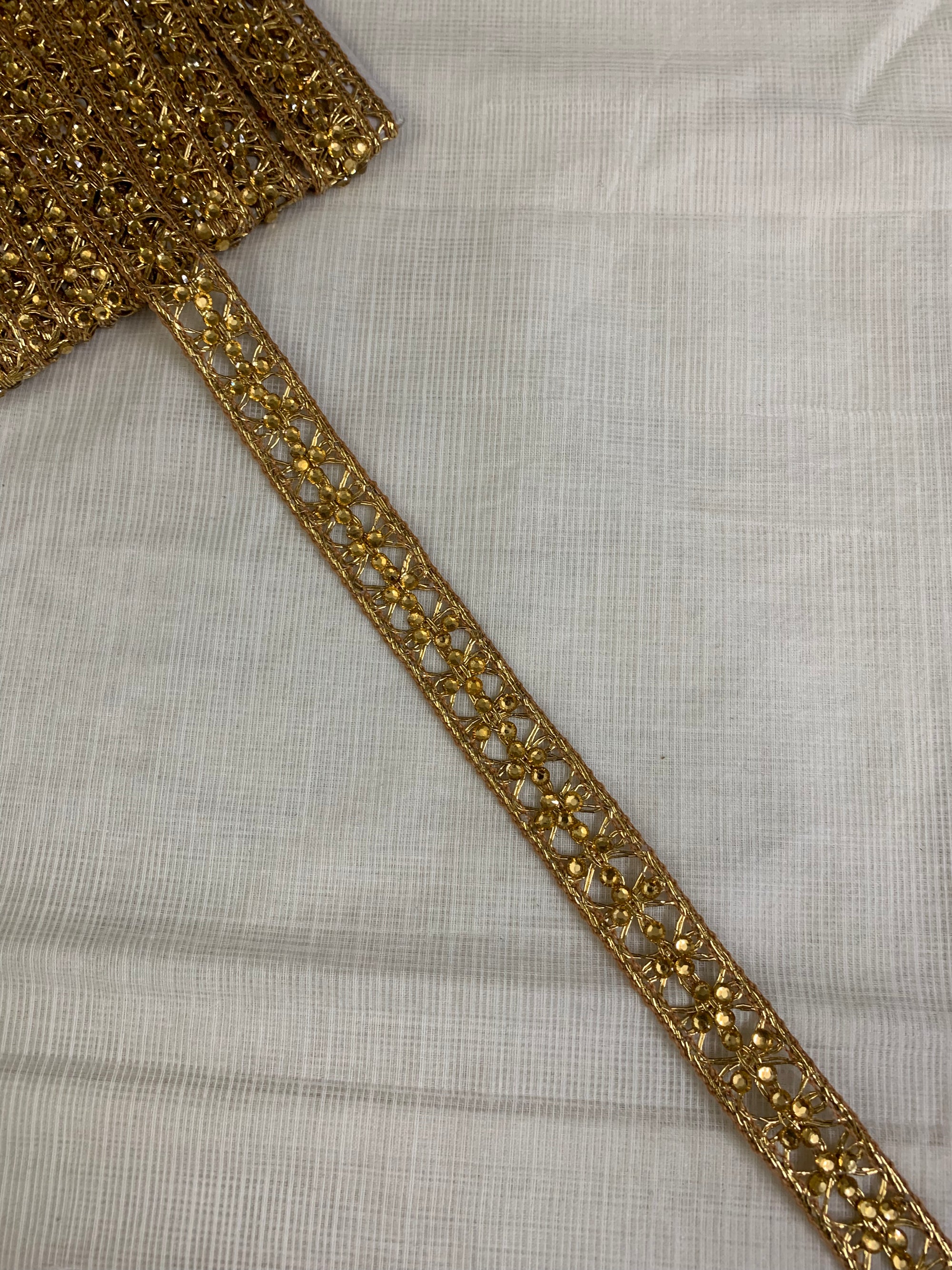 Embroidered lace 9 metres roll gold