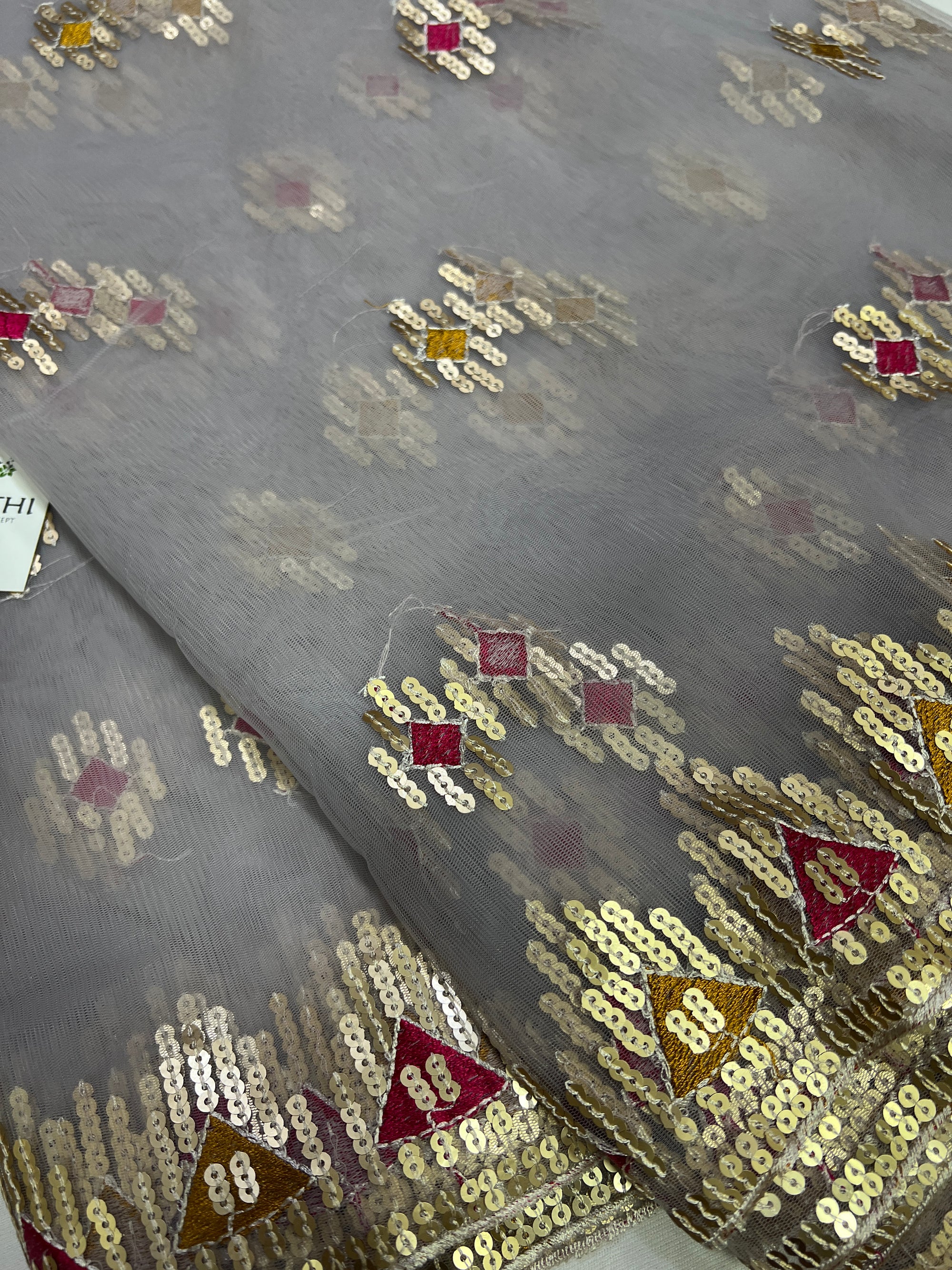 Embroidery on net fabric