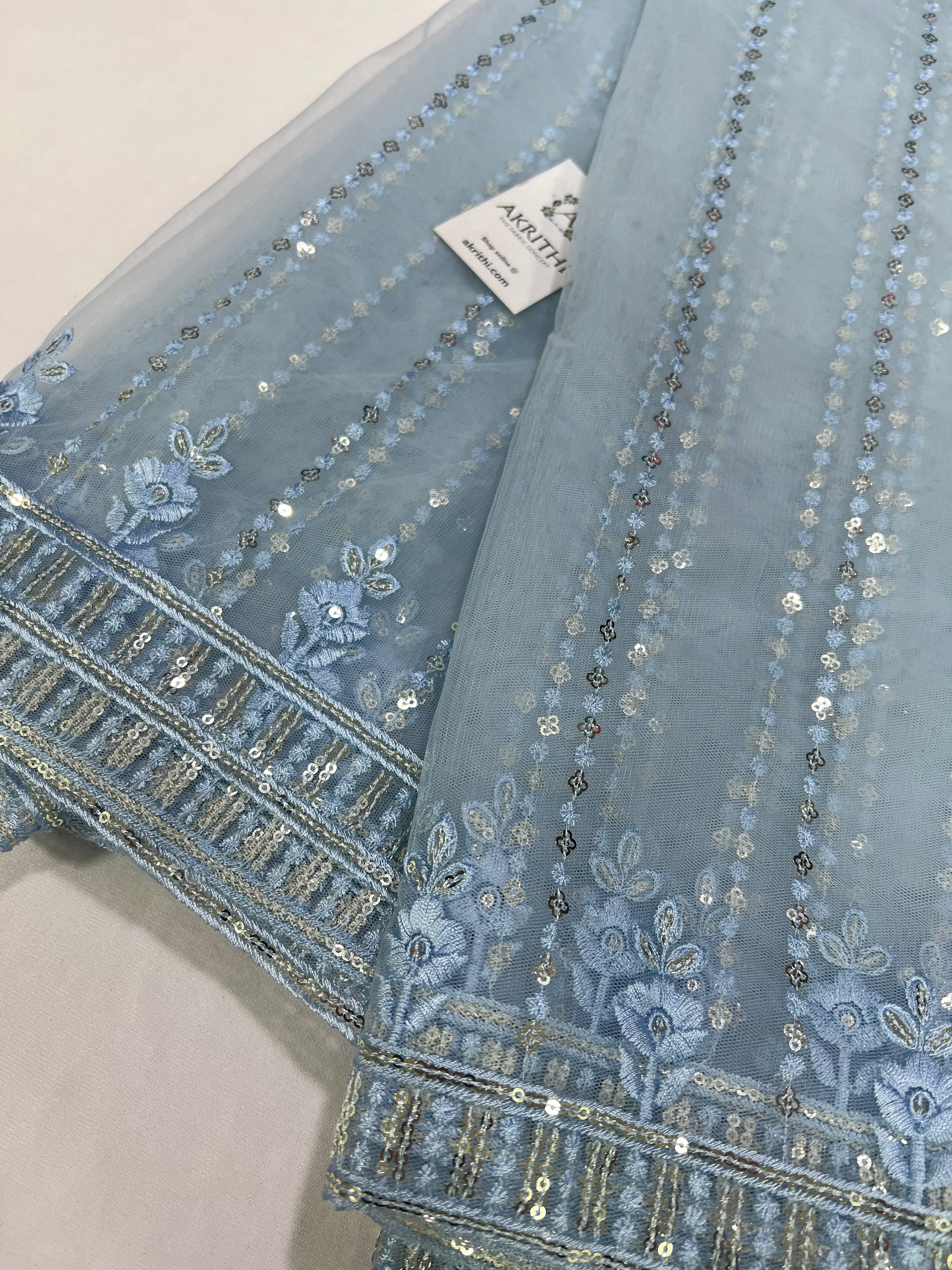 Embroidery on net fabric